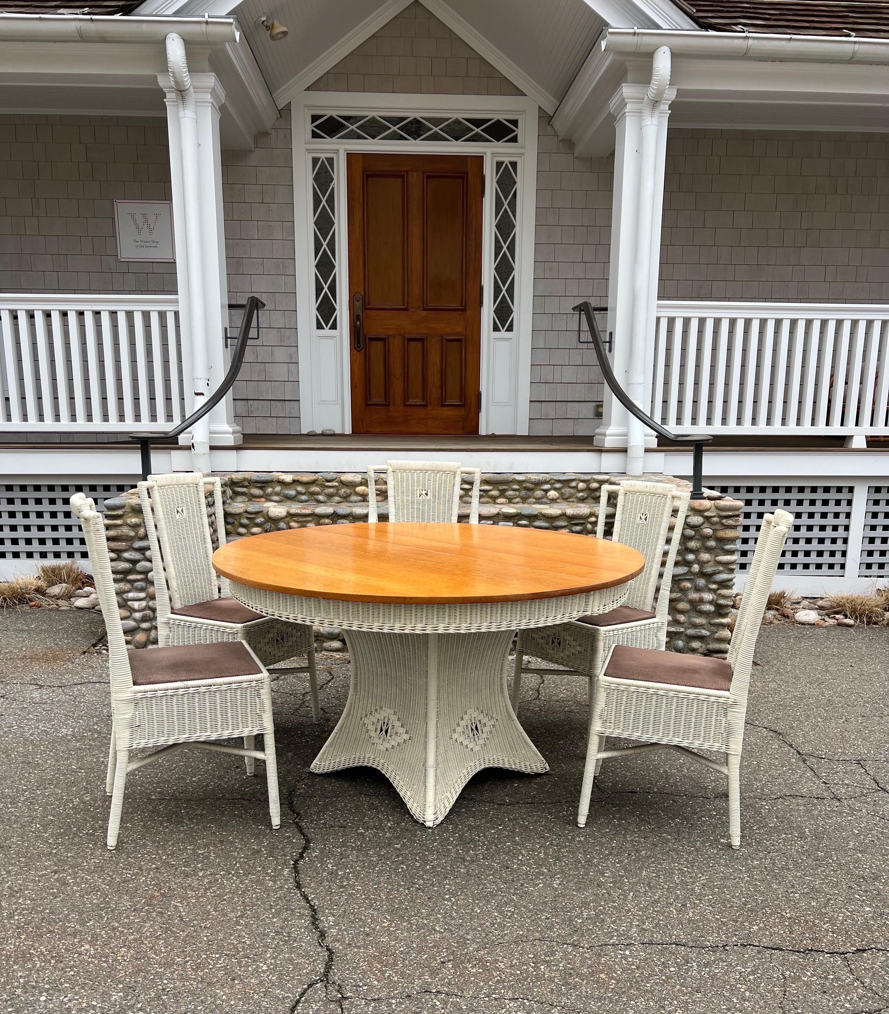 Antique Gilbert Prince dining set with six chairs and matching china cabinet. This is a rare and beautiful set. Solid oak pedestal table top measures 54” in diameter and the table is 30.5” tall. Chairs are 38” tall, 16” deep, 16” wide. Armchair is