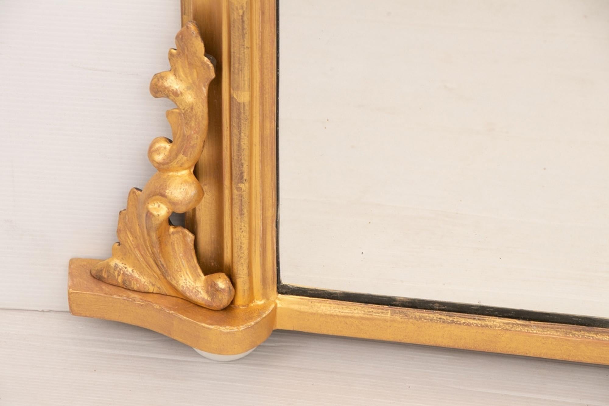 English antique giltwood overmantle mirror, circa 1890. Sizes: 126.5 high, 119 max width, superb quality 23.5-carat genuine gold leaf water gilding. Original mirror plate with overall foxing, original backing boards. A Victorian mirror fully