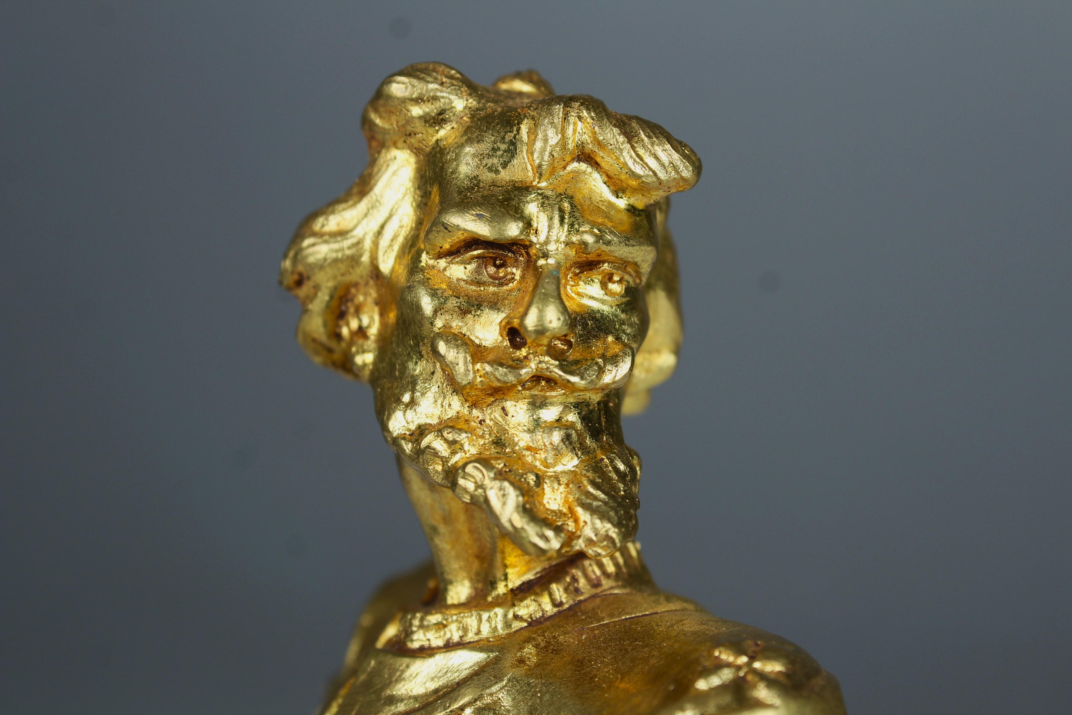 Scultura antica in bronzo dorato, 