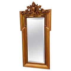 Antique Gilded Wall Mirror with Beveled Glass and Ornate Frame (Miroir mural doré avec verre biseauté et cadre orné)