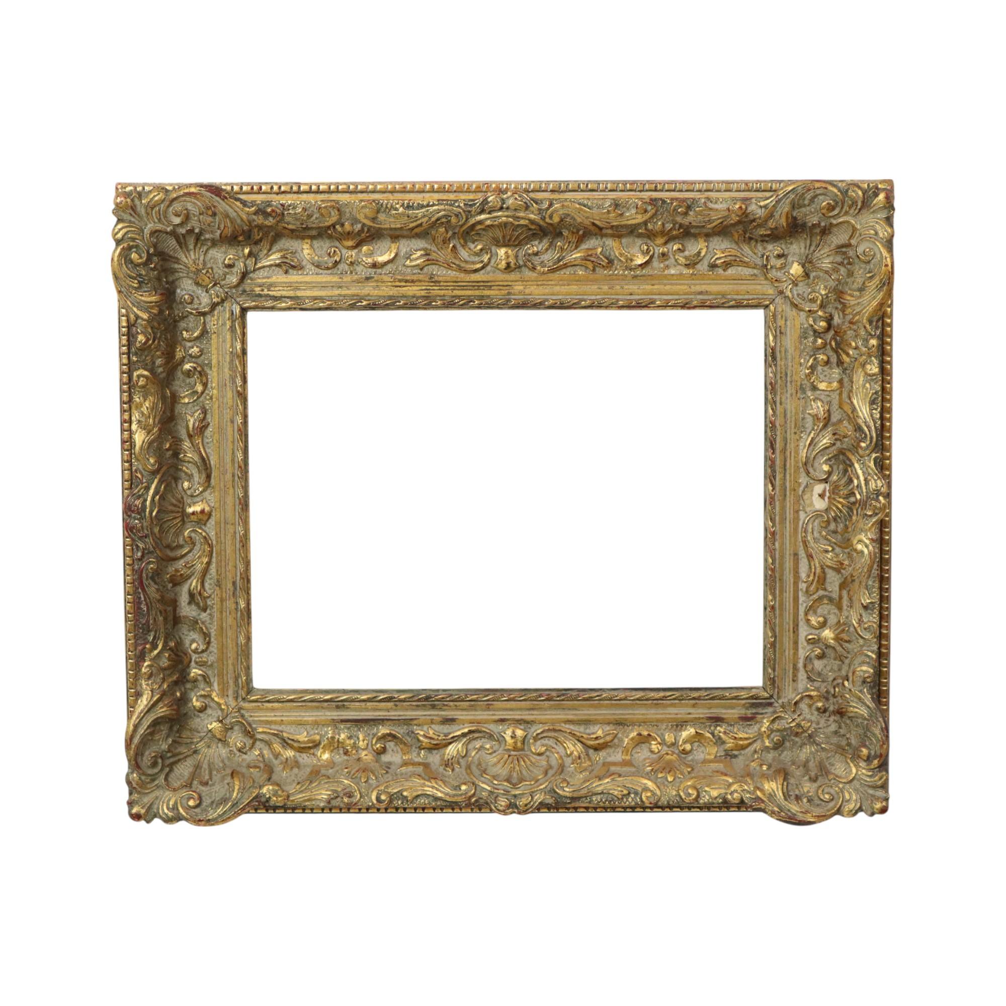 Beautiful, gold-leafed, classic frame, entirely in the typical Baroque style, elaborately decorated with acanthus leaves, ribbons, and patterns, made of pine and plaster, circa 1900.

This fantastic antique frame has stood the test of time well,