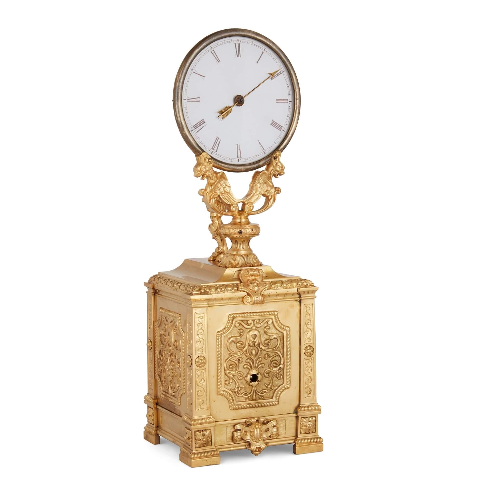 Antique gilt brass and frosted glass mystery clock by Robert-Houdin
French, c. 1850
Height 35cm, width 12cm, depth 11cm

This intriguing mantel clock from the mid-19th century is by Jean Eugene Robert-Houdin (French, 1805-1871). He was a renowned