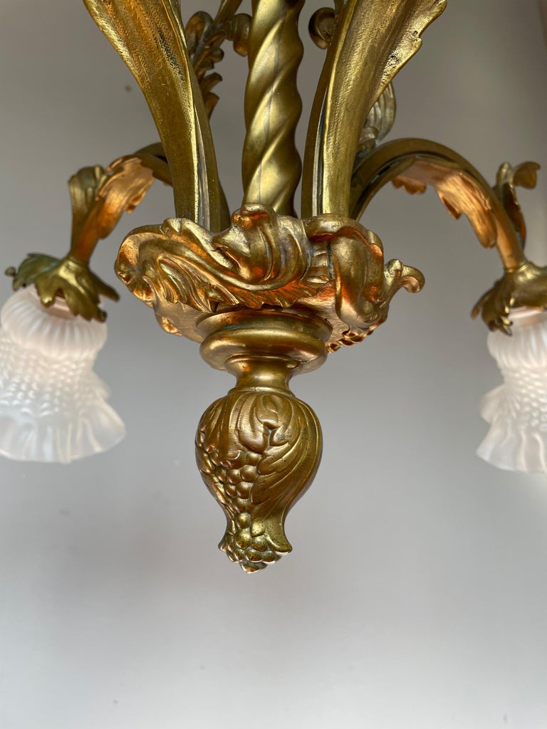 Cast Antique Gilt Bronze and Brass Rococo Style Chandelier with Flowery Glass Shades For Sale