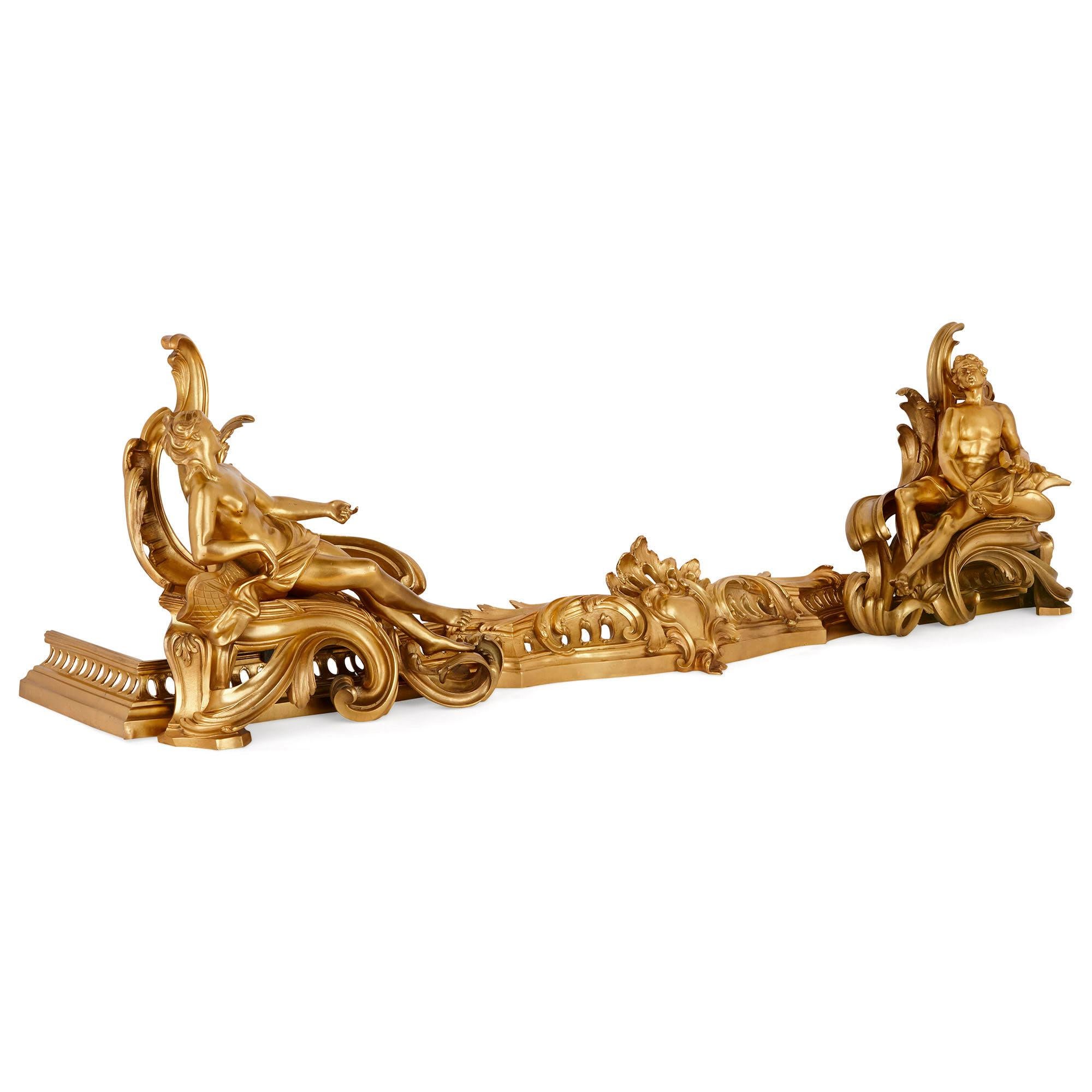 This elegant gilt bronze (ormolu) fireplace fender was created in France in the late 19th century. The item will add splendour and beauty to a fireplace, making it the focal point of a room.

The fender features a pierced rail which is decorated