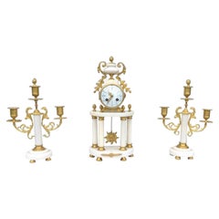 Antique French, orologio da tavolo in bronzo dorato con guarnizione di marmo