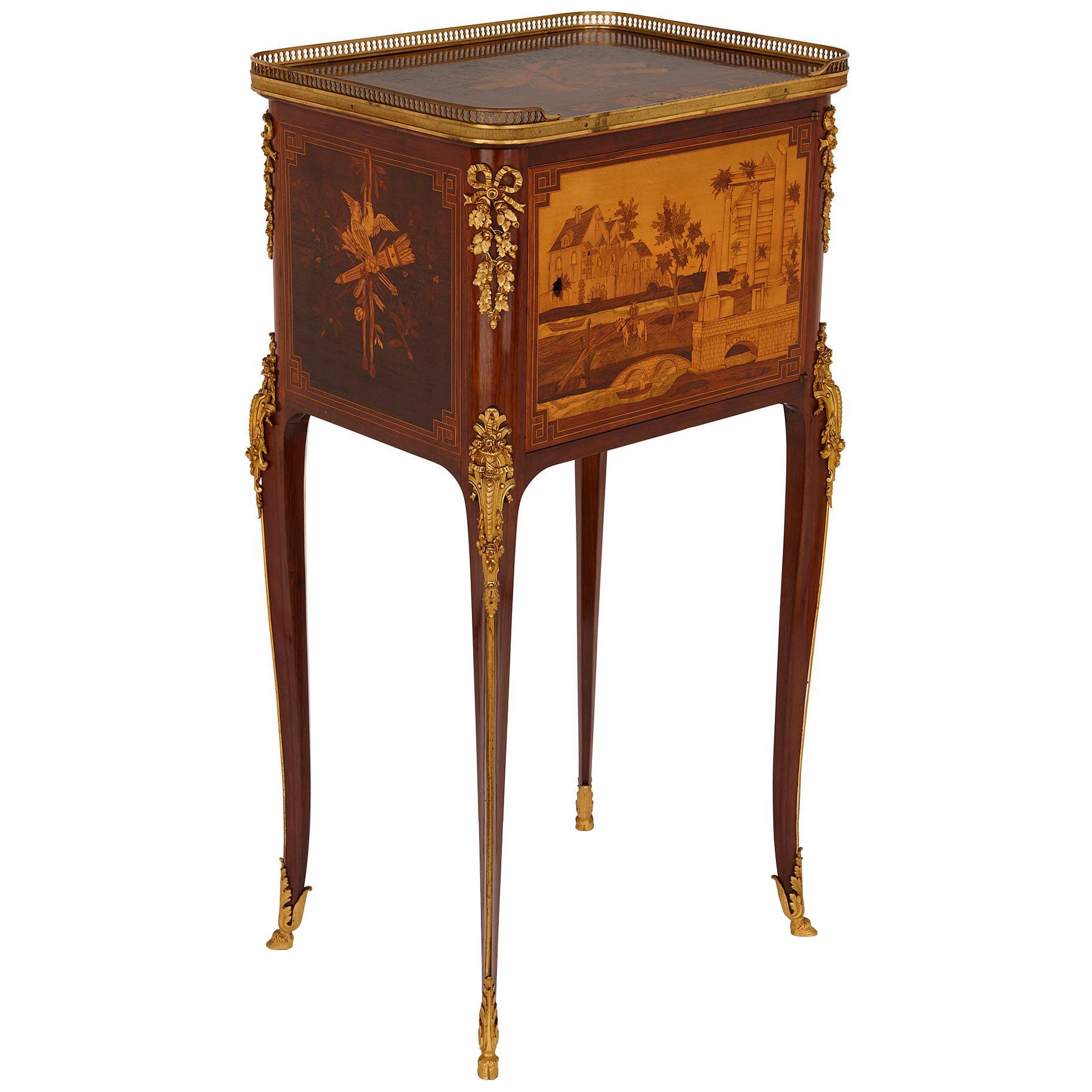 Antique gilt bronze mounted occasional table with marquetry panels For Sale