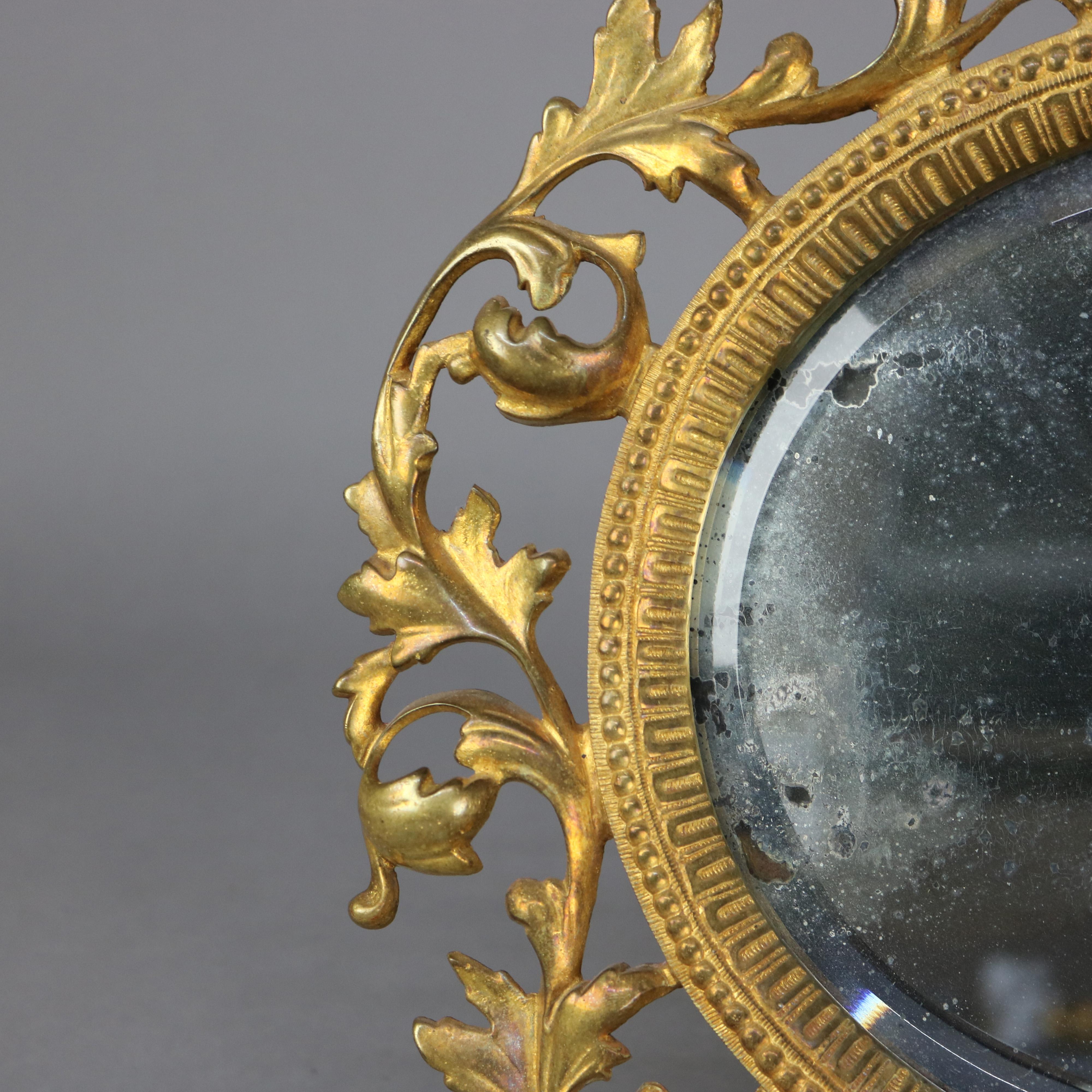 Miroir dressoir ancien en bronze doré réticulé en forme de feuillage, vers 1890

Mesures : 15,25 