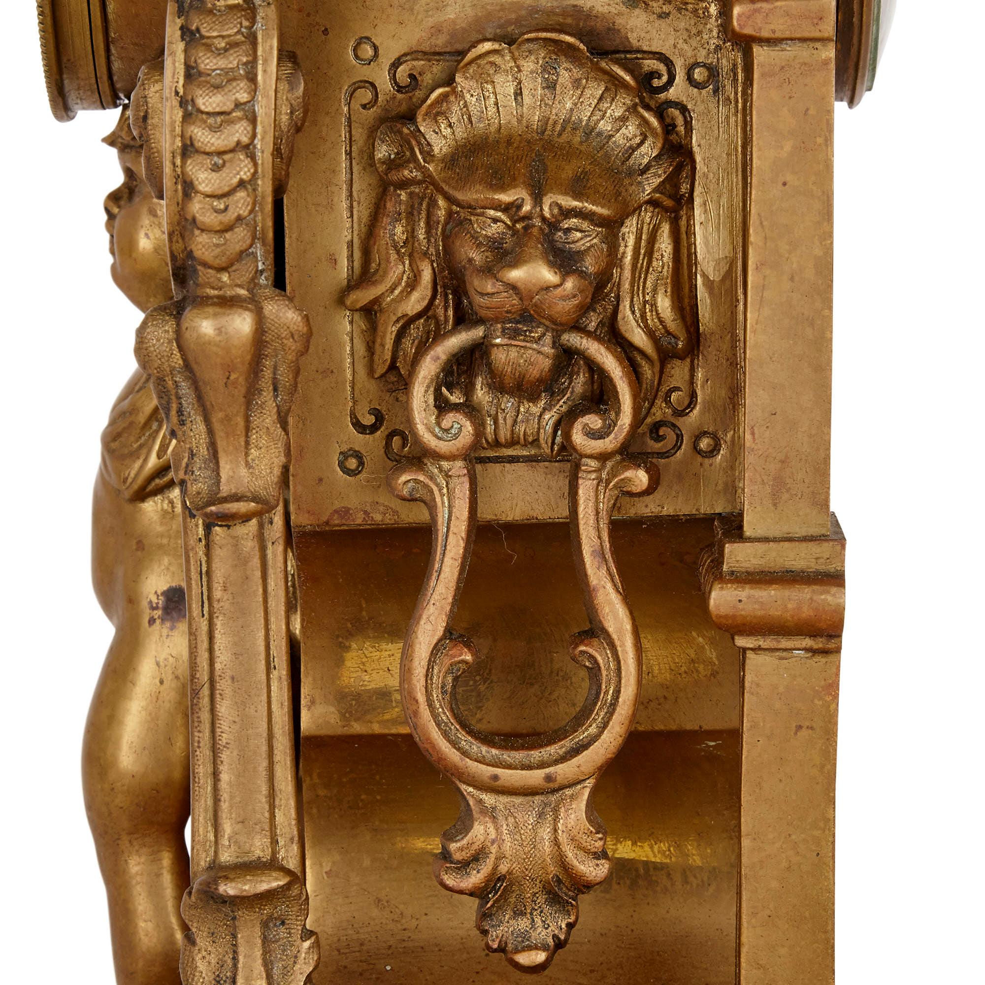 XIXe siècle Garniture d'horloge en bronze doré antique à trois pièces en vente