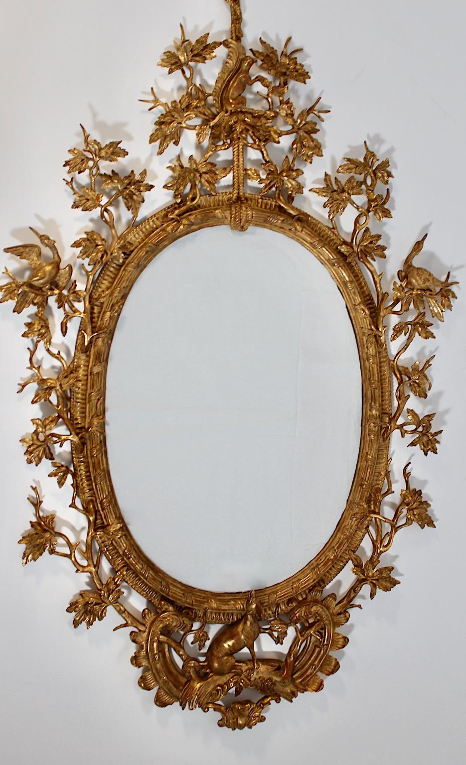 Miroir mural ancien en bois sculpté et doré de style Thomas Johnson vers 1830 Bon état - En vente à Vienna, AT