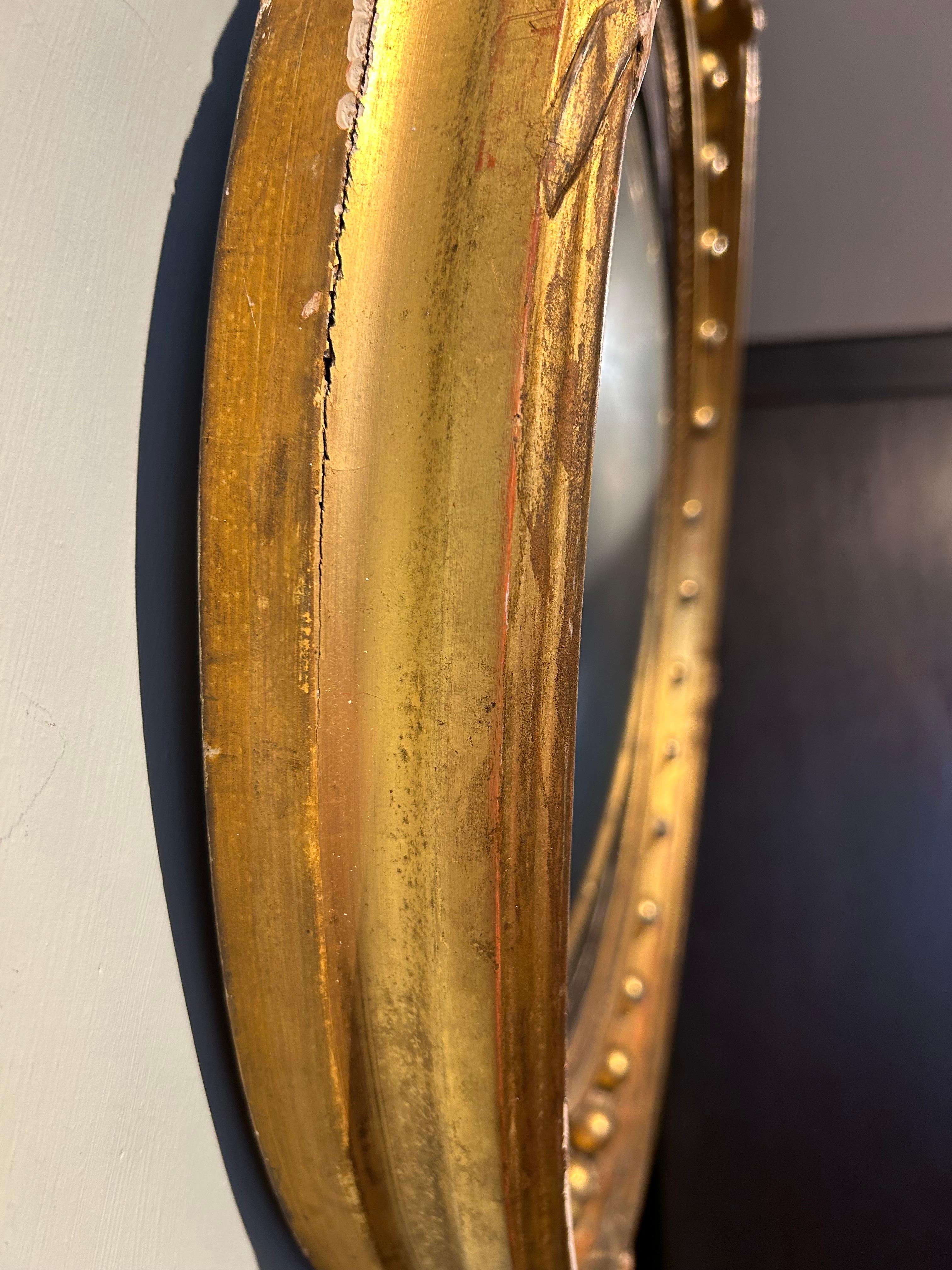 English Antique Gilt Convex Mirror Retaining Its Original Mirror Glass circa 1850 For Sale