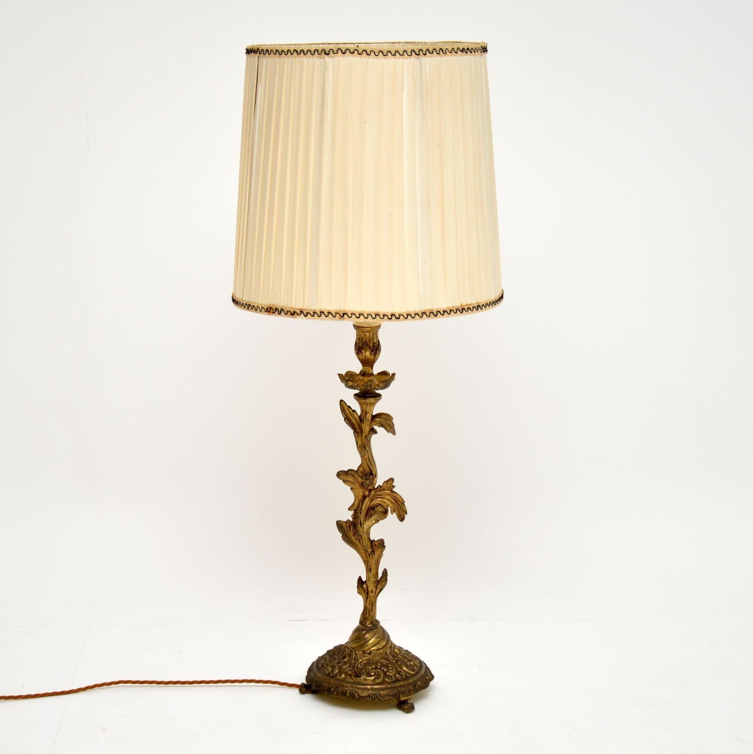 Antique gilt metal table lamp in good original condition, dating from circa 1930s period. We have just had it re-wired, so it’s in good working order. I believe this lamp is French & it’s well cast with some nice details. We have added the old