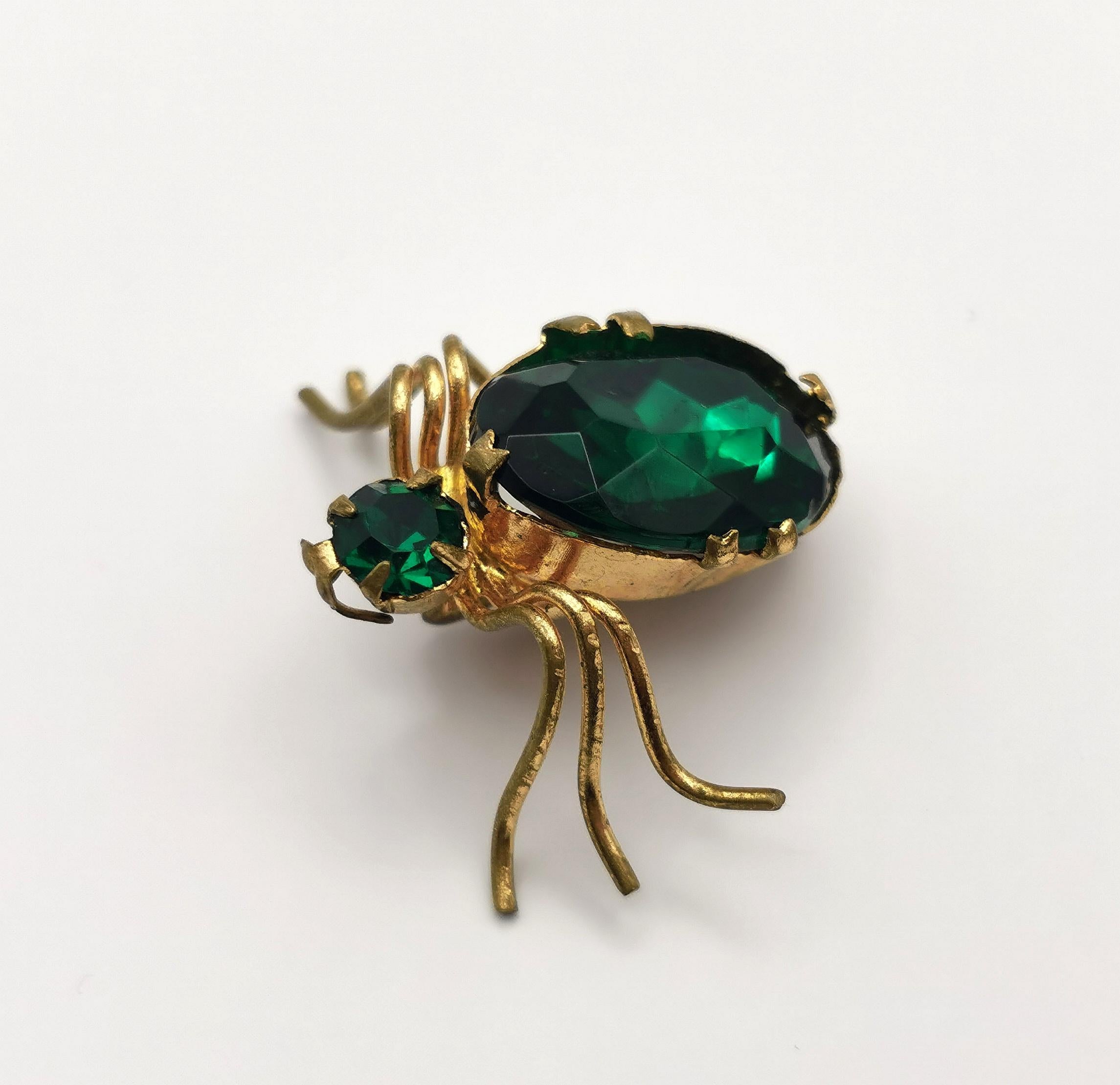 Women's Antique Gilt Spider brooch. Emerald green paste