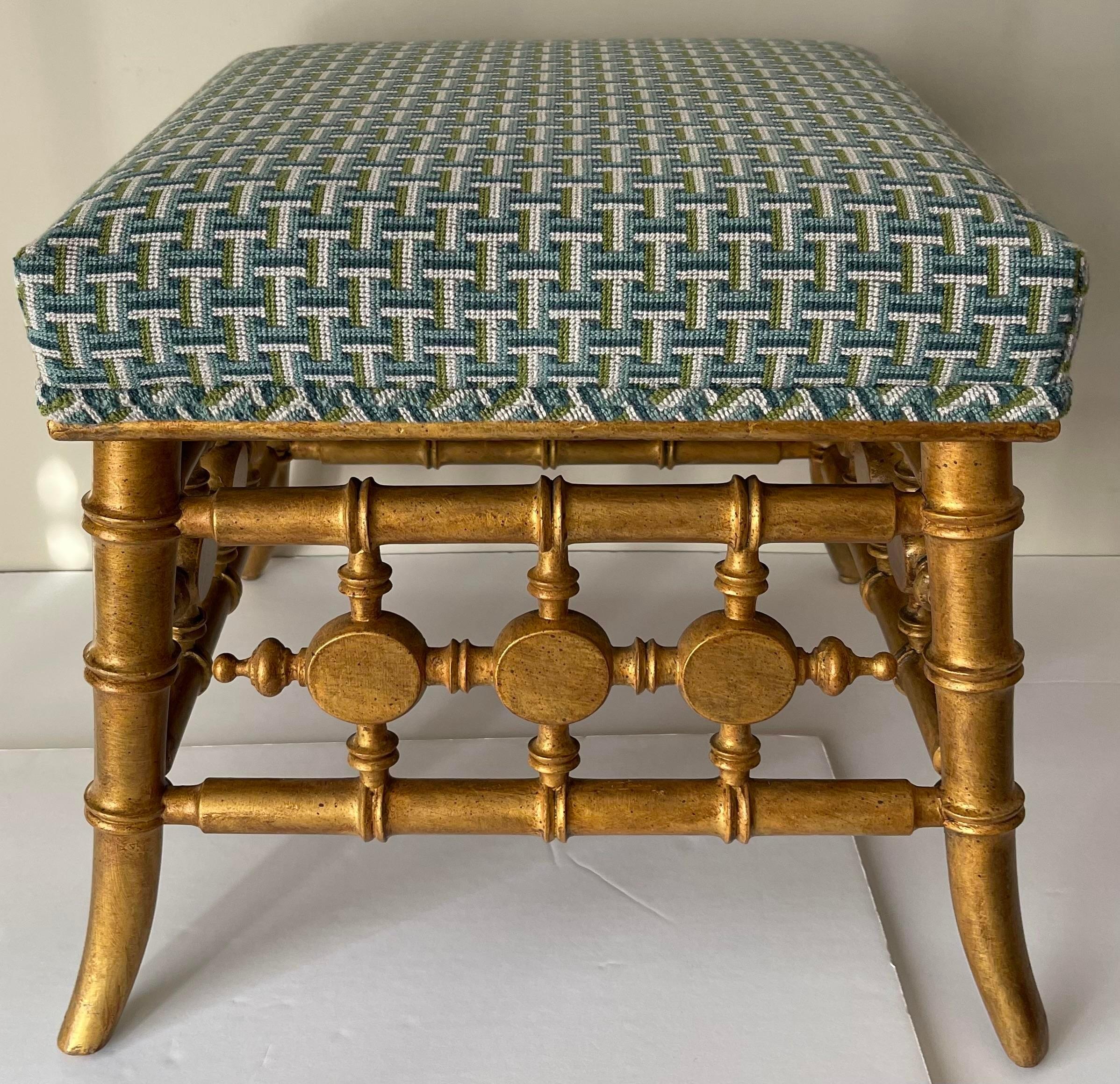 Antique giltwood faux bamboo stool. Newly painted in antique gold finish. Newly upholstered in Schumacher Saxon epingle fabric.