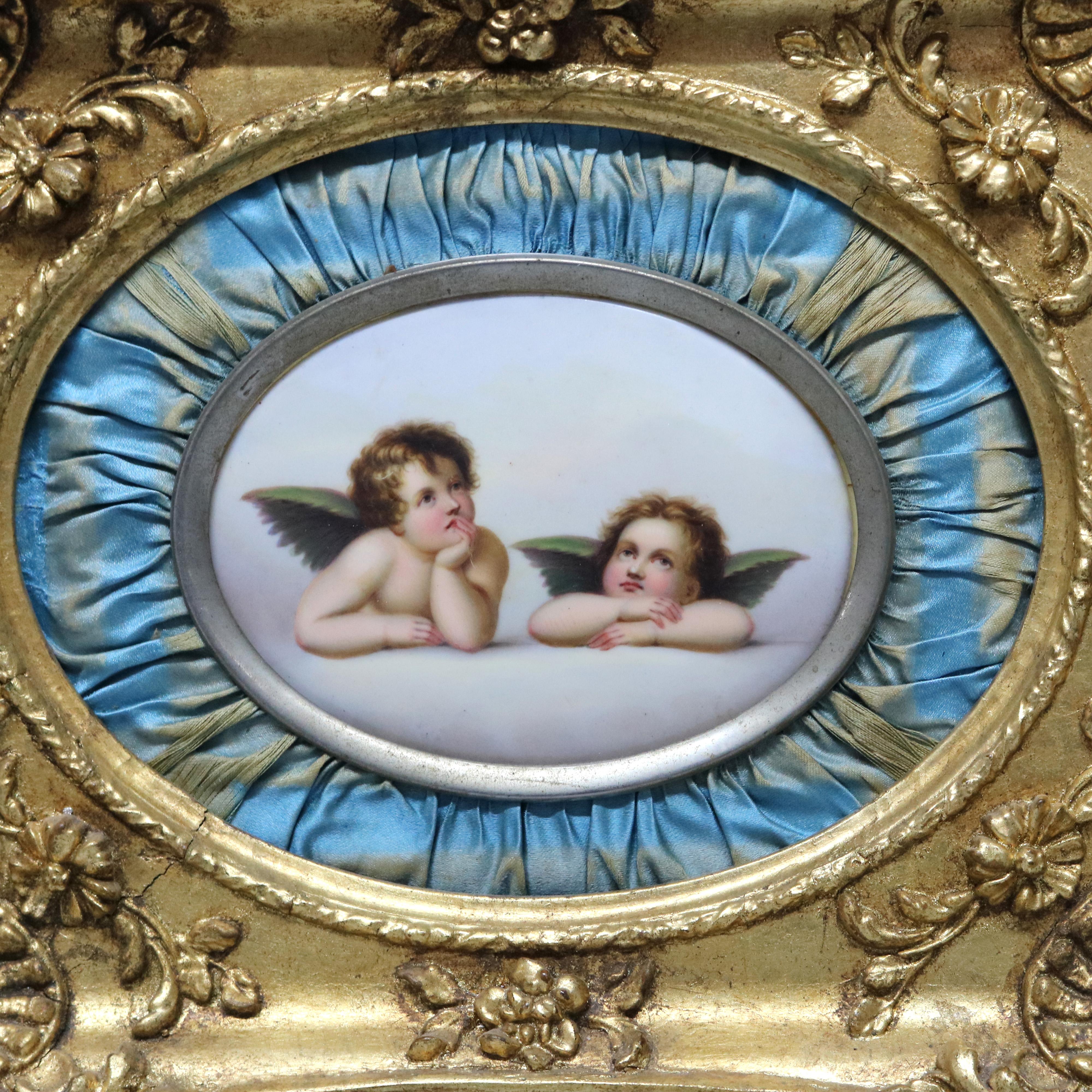 An antique painting on porcelain in the manner of KPM offers two Classical cherubs, seated in satin lined giltwood frame, 19th century

Measures: 10
