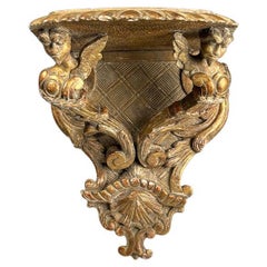 Soporte de pared antiguo de madera dorada con grifos - Renacimiento