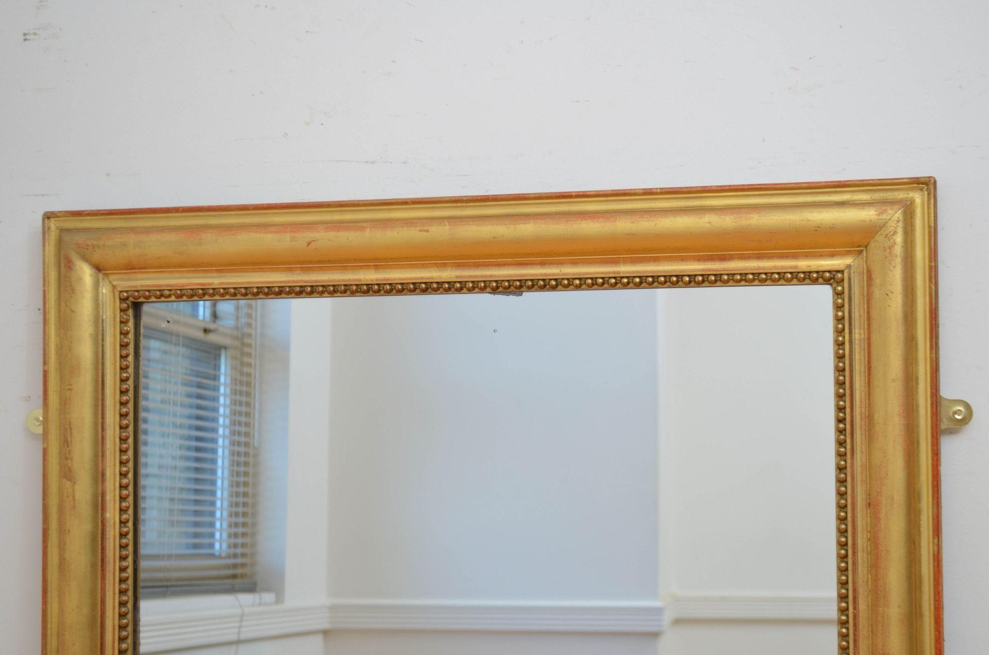 Miroir mural ancien en bois doré, H141 cm en vente 1