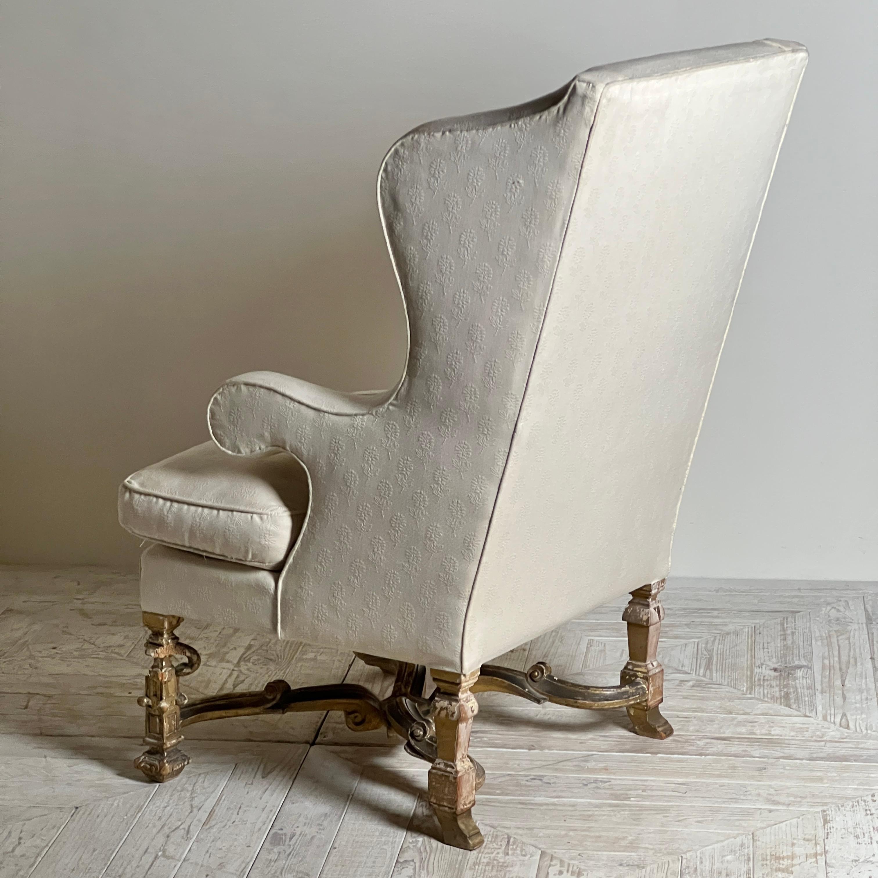 Inconnu Antique Giltwood Wingback Armchair In The Late 17Th Style en vente