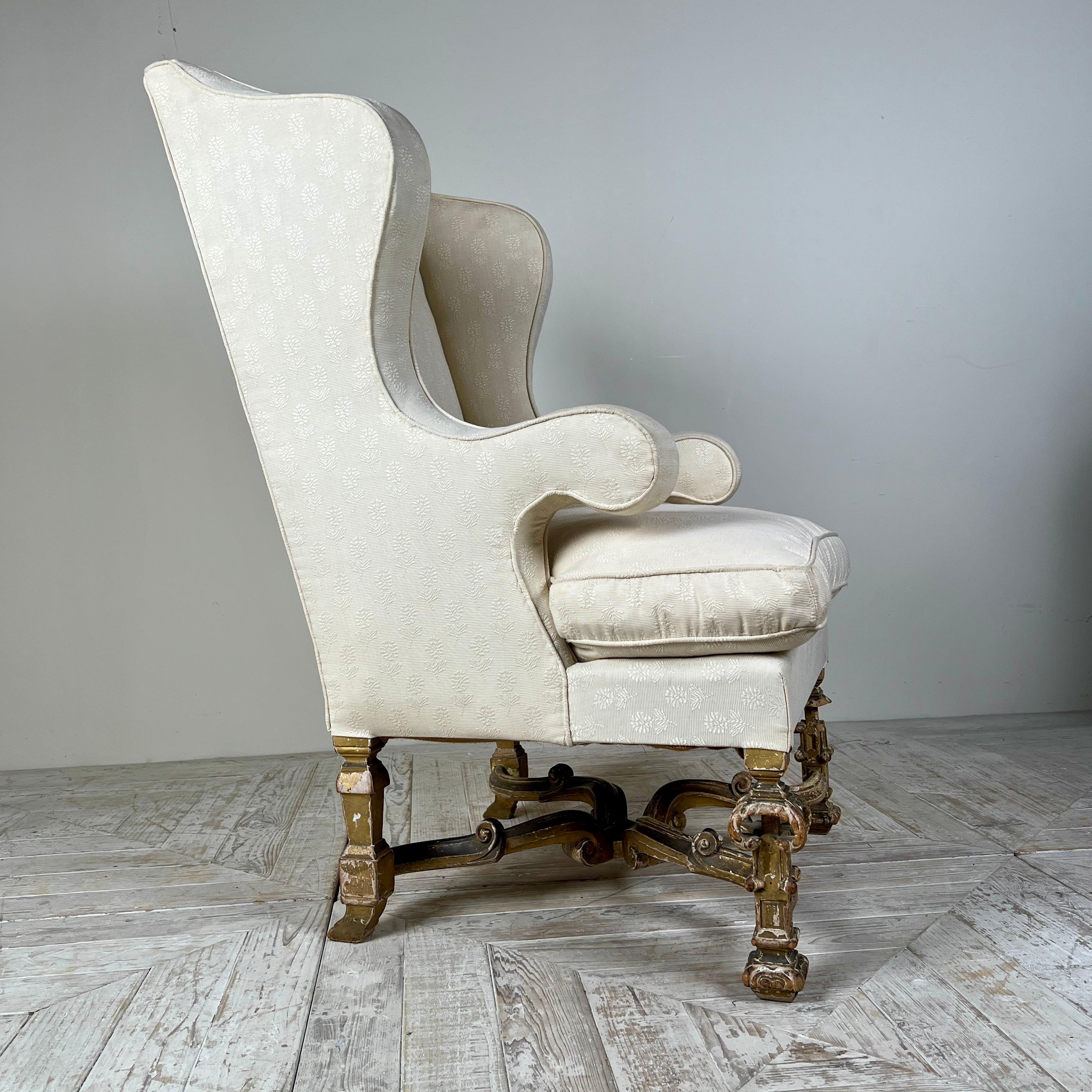 XVIIIe siècle Antique Giltwood Wingback Armchair In The Late 17Th Style en vente