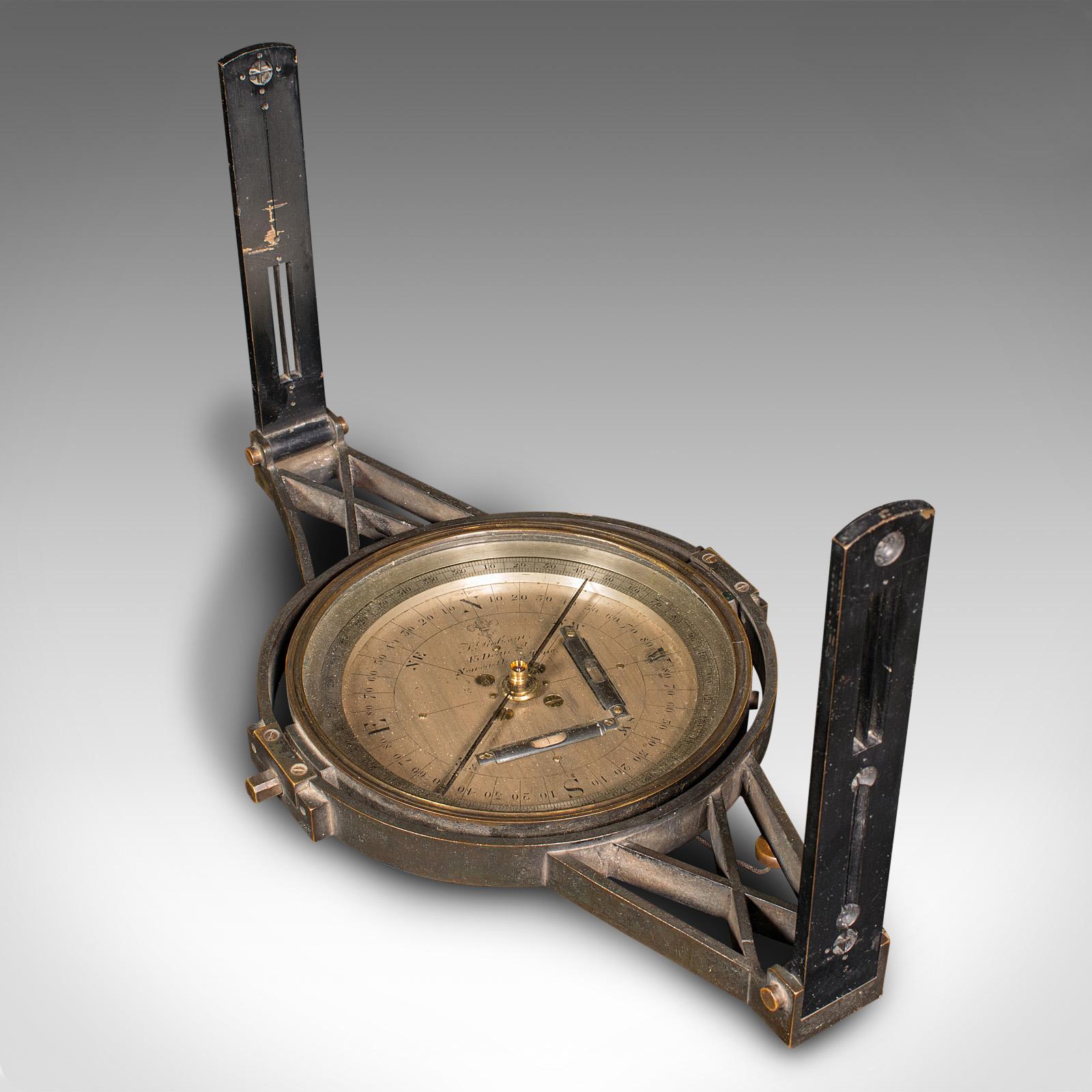 This is an antique gimballed compass. An English, brass and glass decorative scientific instrument for display, dating to the late Victorian period, circa 1900.

Fascinating decorative compass, replete with carry case
Displays a desirable aged