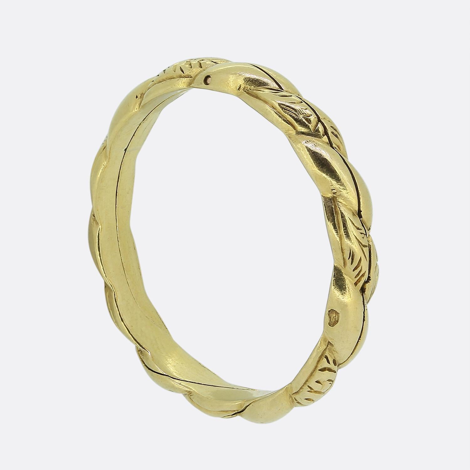 Here we have a delightful antique gimmel ring. Crafted from 18ct yellow gold, this ring is comprised of two separate hoops linked together with the same shank split lengthwise so the hoops fit together seamlessly as one. The  ring features ornate
