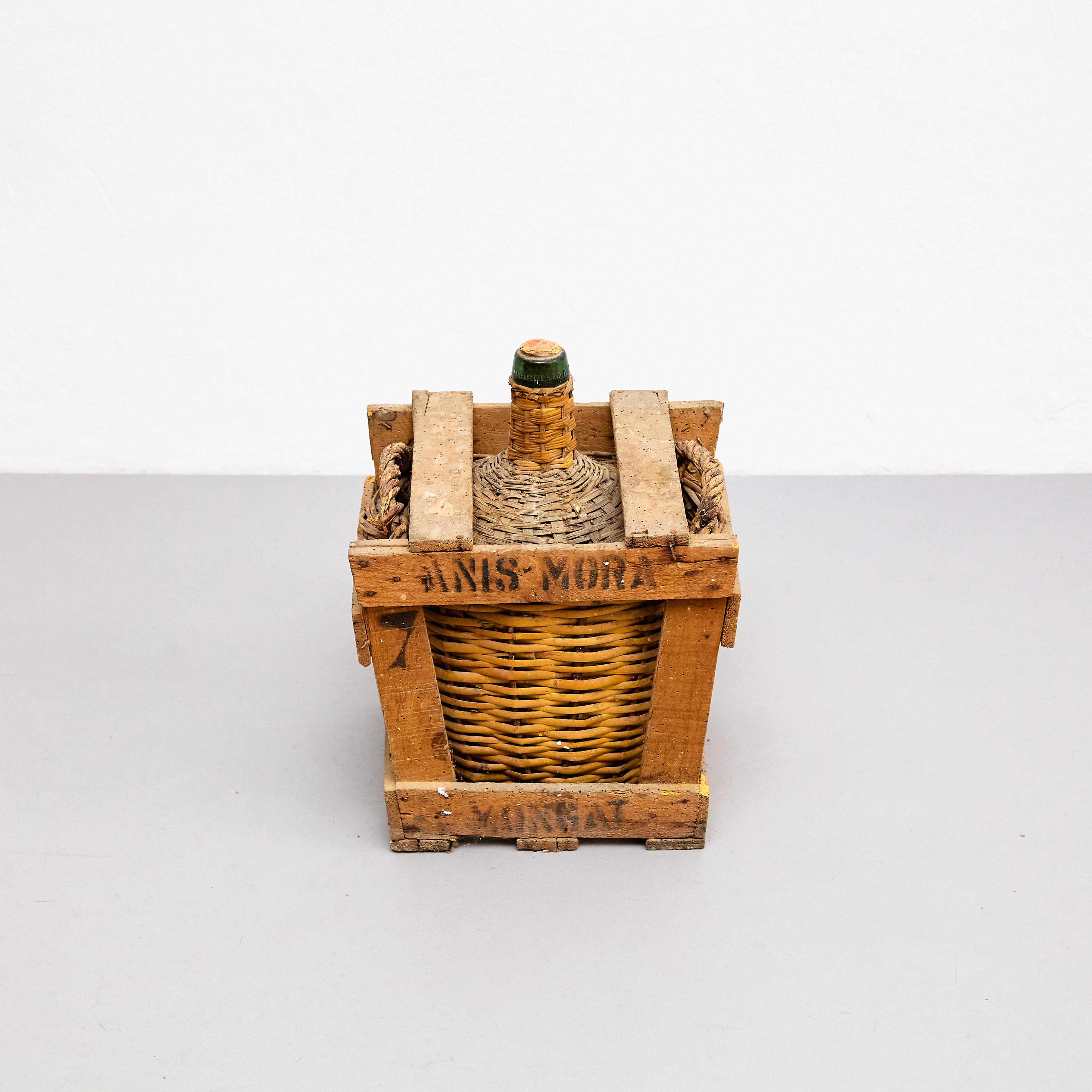 Spanish Antique Glass Bottle Vase with Wicker Basket, circa 1960 For Sale