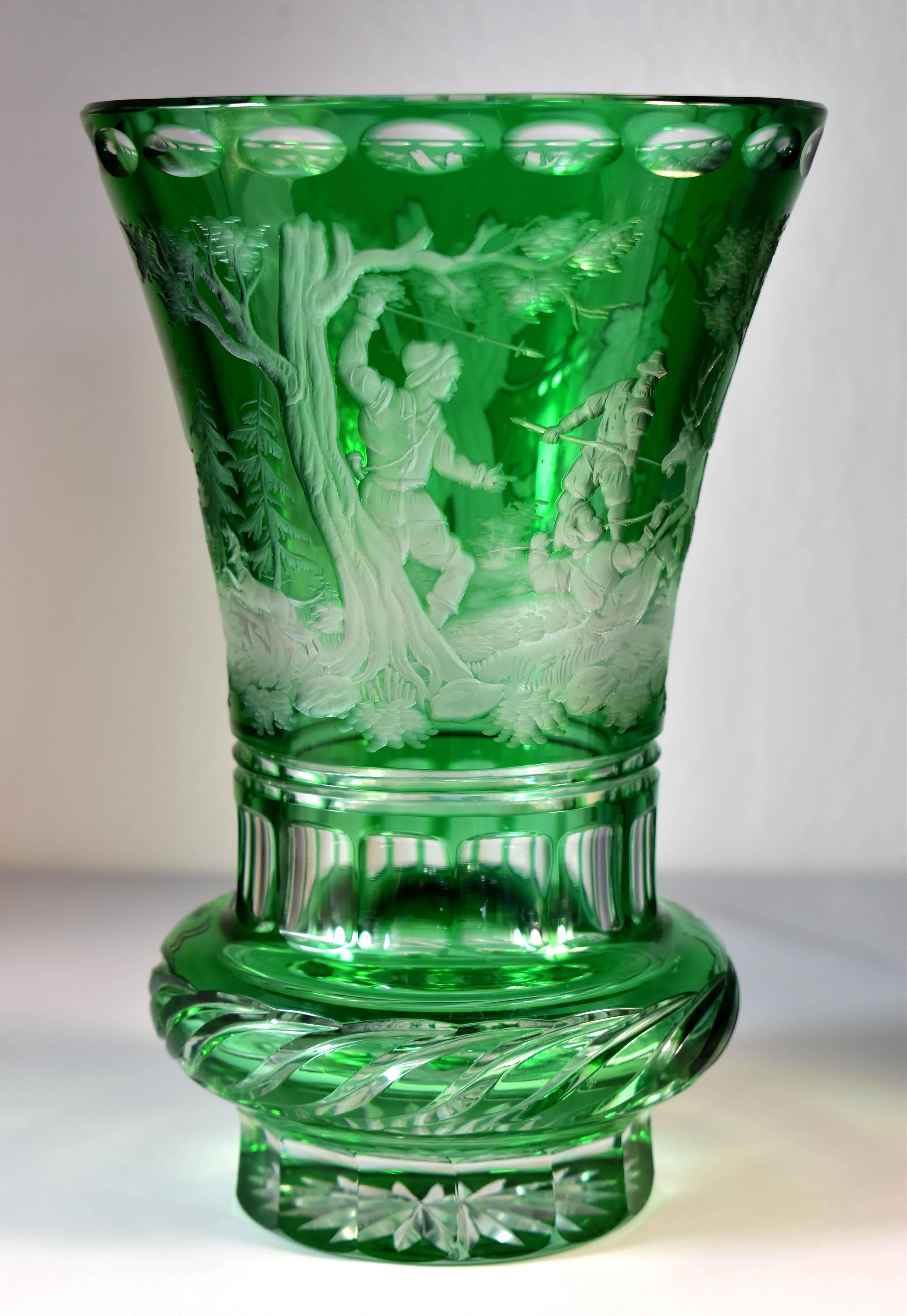 Beautiful green overlay vase, cut with an engraved hunting motif, Depicted deer hunting scene, The engraving is made using the old copper engraving technique, This is Bohemian glass from the 20th century, It is a beautiful collector's piece that