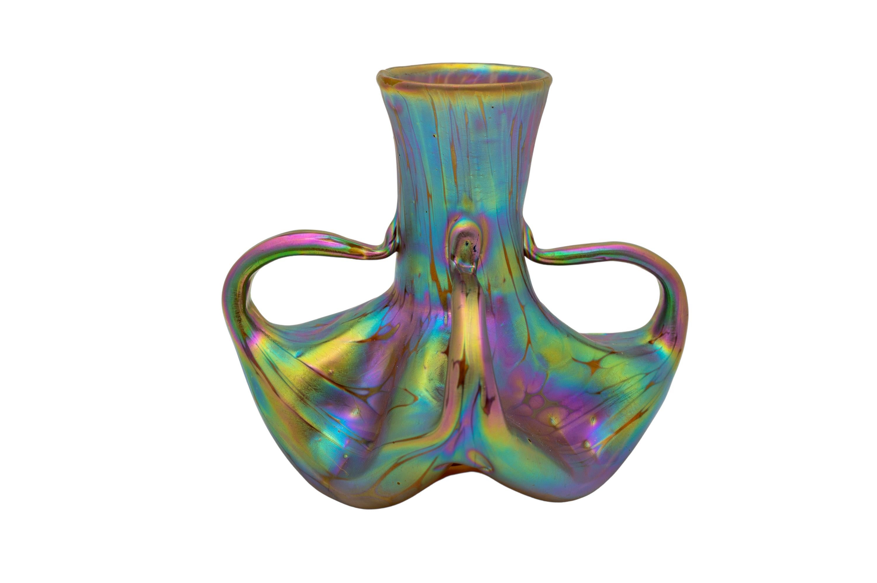 Vase, Johann Loetz Witwe, PG 1/413 decoration, circa 1901, signed 

Material and technique: glass, mould-blown and freeform, reduced and iridescent

Bib.: A. Adlerova, E. Ploil, H. Ricke, T. Vlcek (ed.), Loetz – Böhmisches Glas 1880-1940, vol. I,