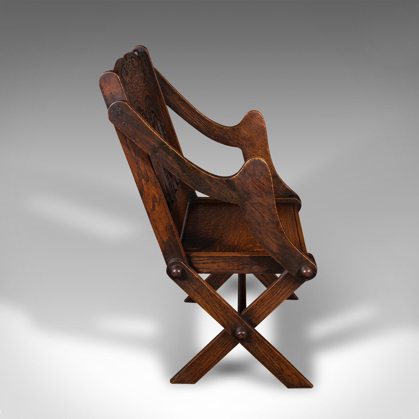 Late Victorian Antique Glastonbury Chair, Welsh Oak, Gothic Revival Elbow Seat, Victorian, 1880 For Sale