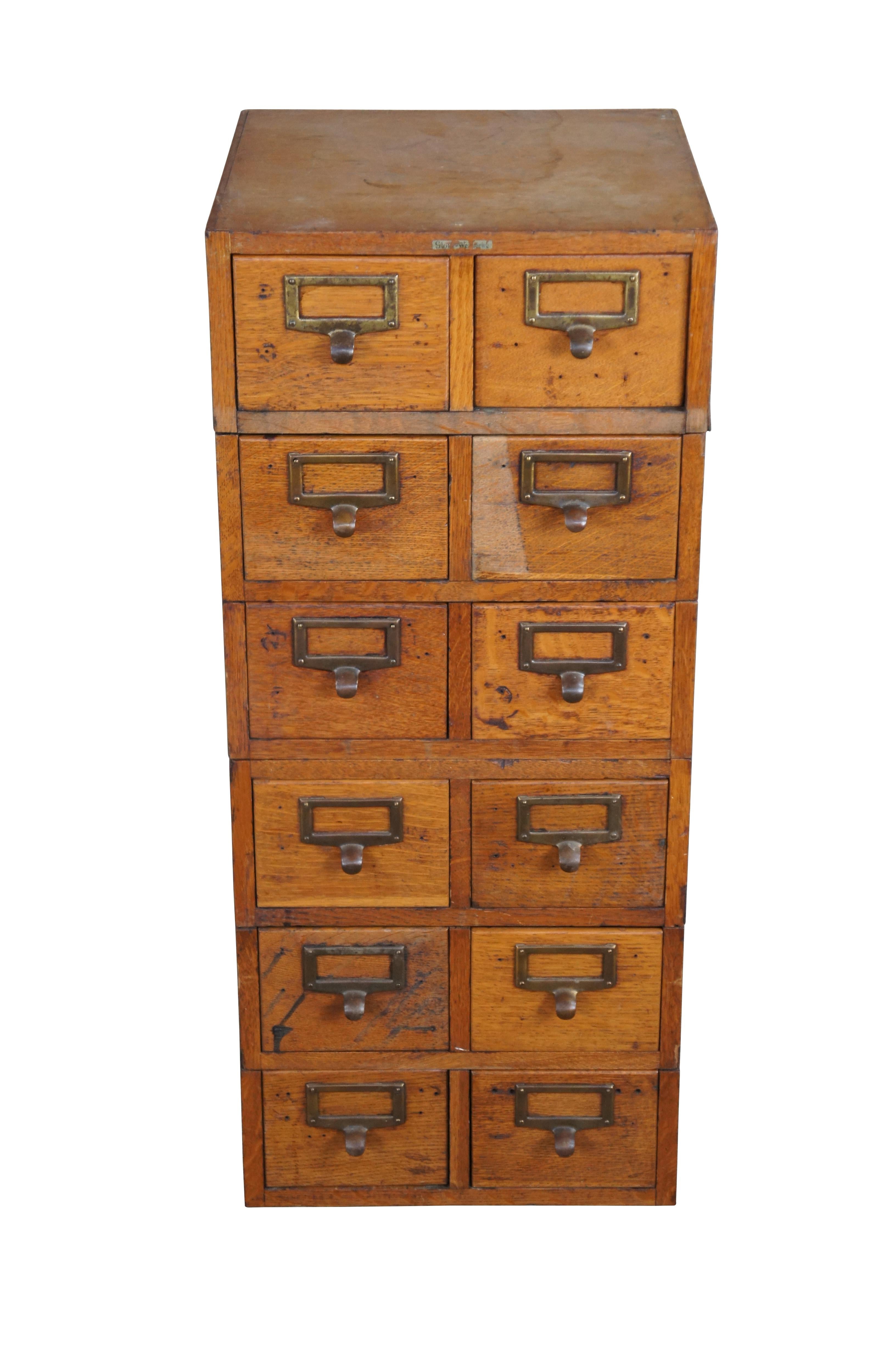 1930s Globe Wernicke two drawer stacking file card / index cabinet.  Made from quartersawn oak with six two drawer sections.  Each drawer opens independently and features a brass pull with space for a label.

Dimensions:
18.5