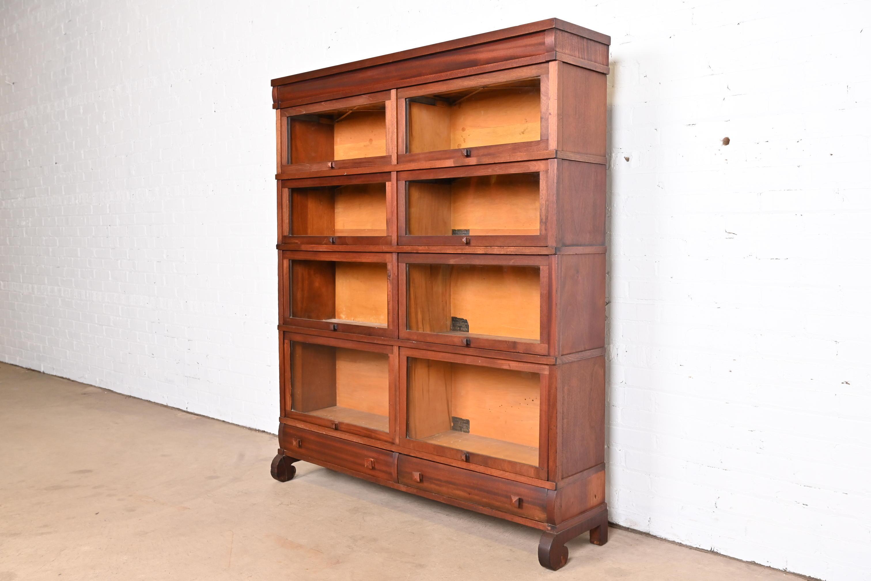 A rare antique Arts & Crafts four-stack double barrister bookcase

By Globe Wernicke

USA, Circa 1900

Mahogany, with glass front doors.

Measures: 51.13