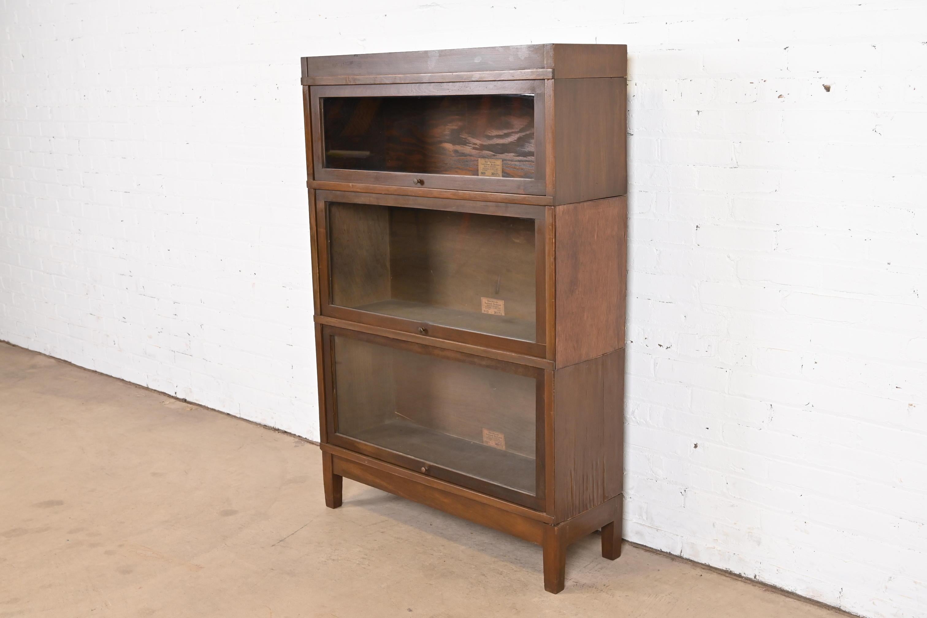 Antique Globe Wernicke Arts & Crafts Walnut Three-Stack Barrister Bookcase In Good Condition In South Bend, IN