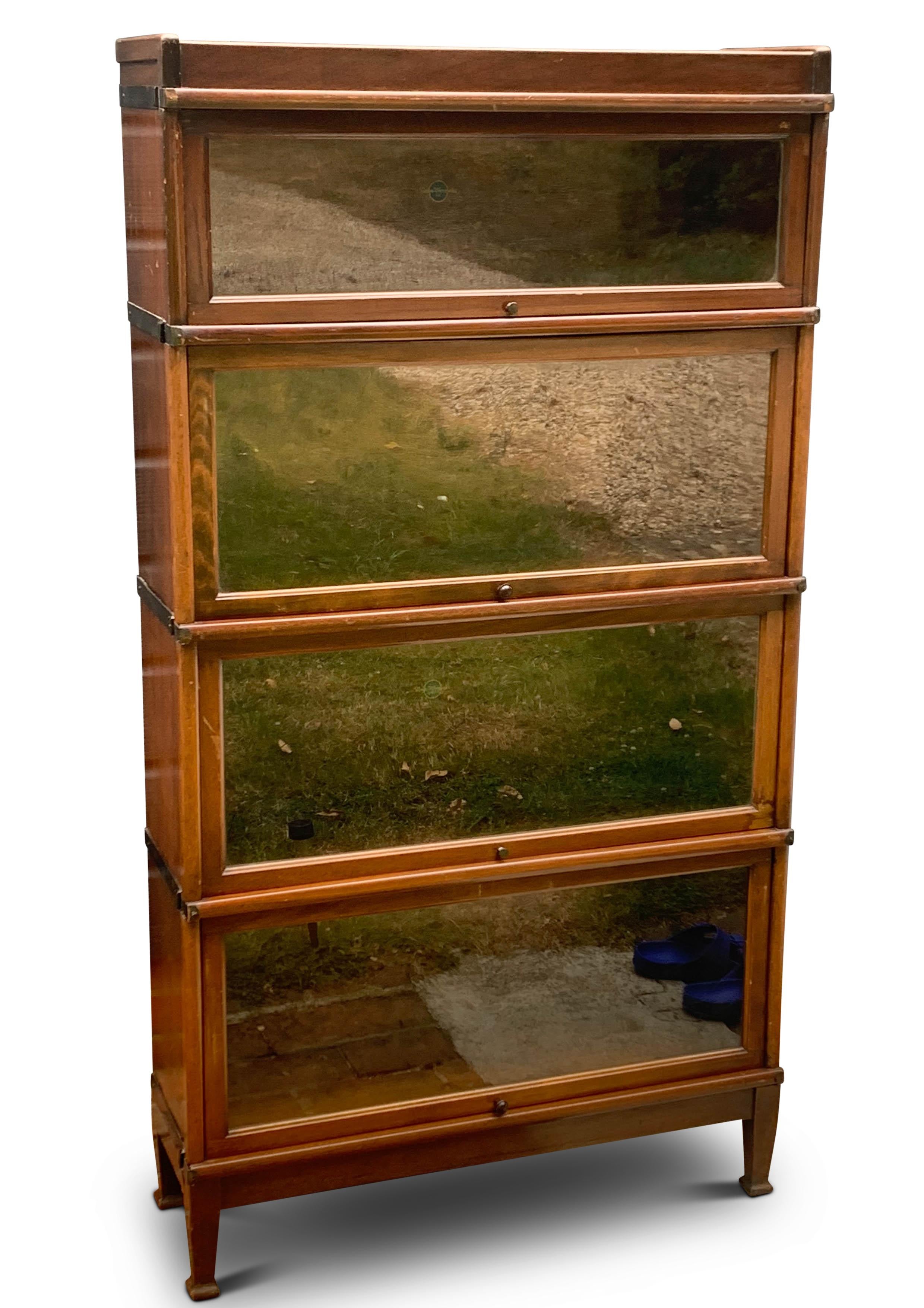 Hand-Crafted Antique Globe Wernicke Four Section Glazed Stacking Barrister's Bookcase For Sale