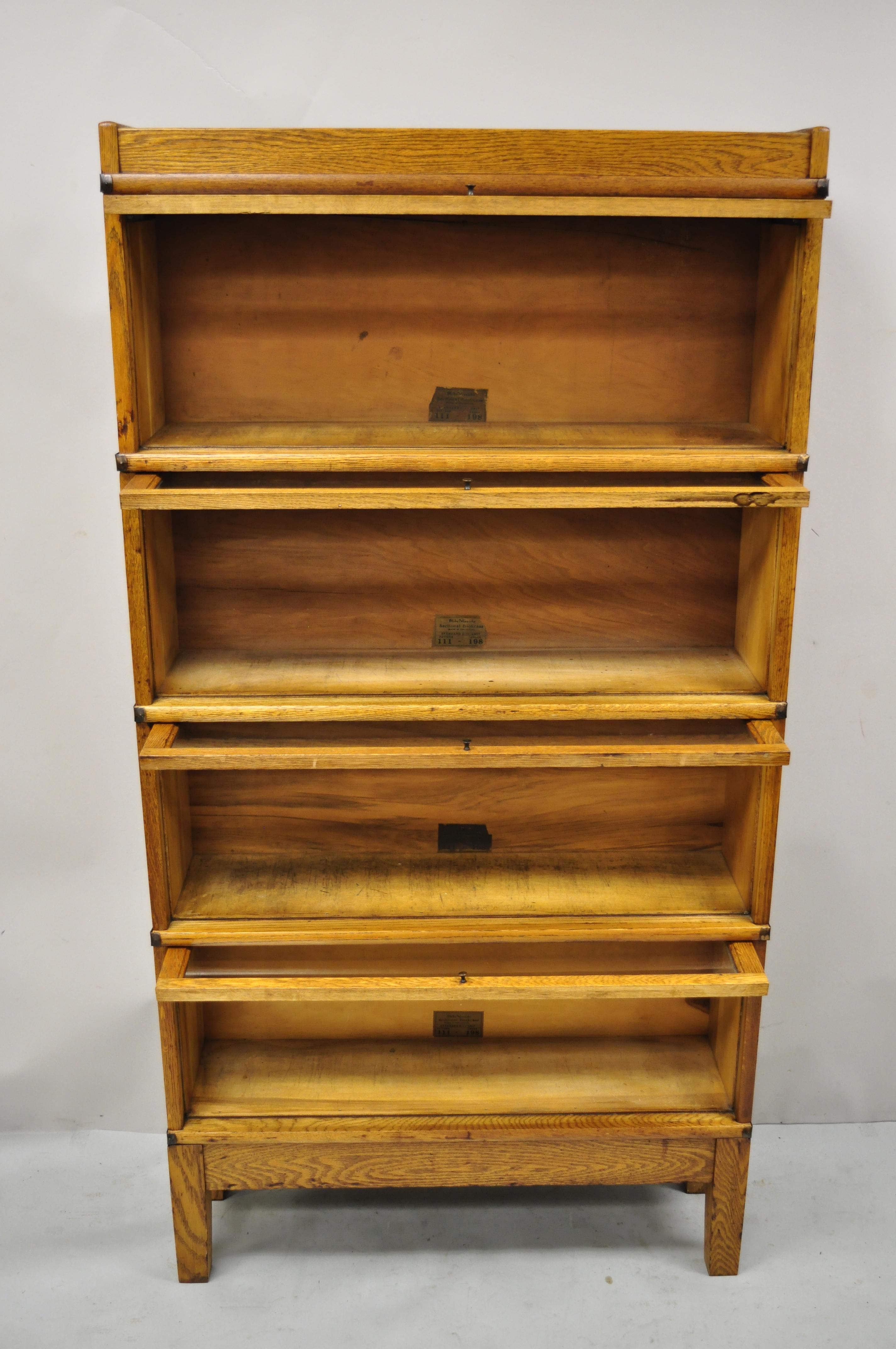Antique Globe Wernicke Golden Oak 4 Section Stacking Barrister Lawyers Bookcase In Good Condition In Philadelphia, PA