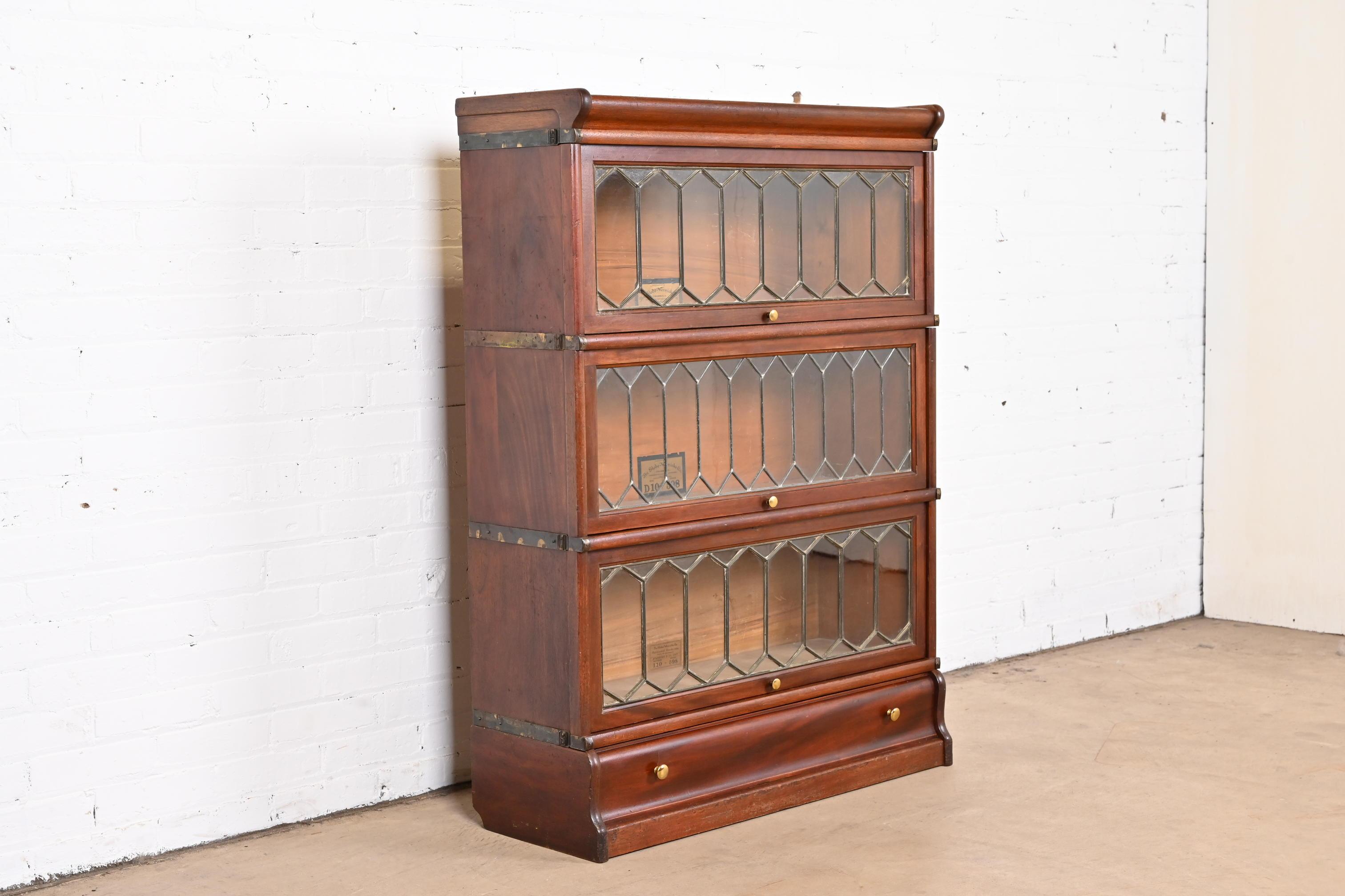 Antique Globe Wernicke Mahogany Three-Stack Barrister Bookcase with Leaded Glass In Good Condition In South Bend, IN