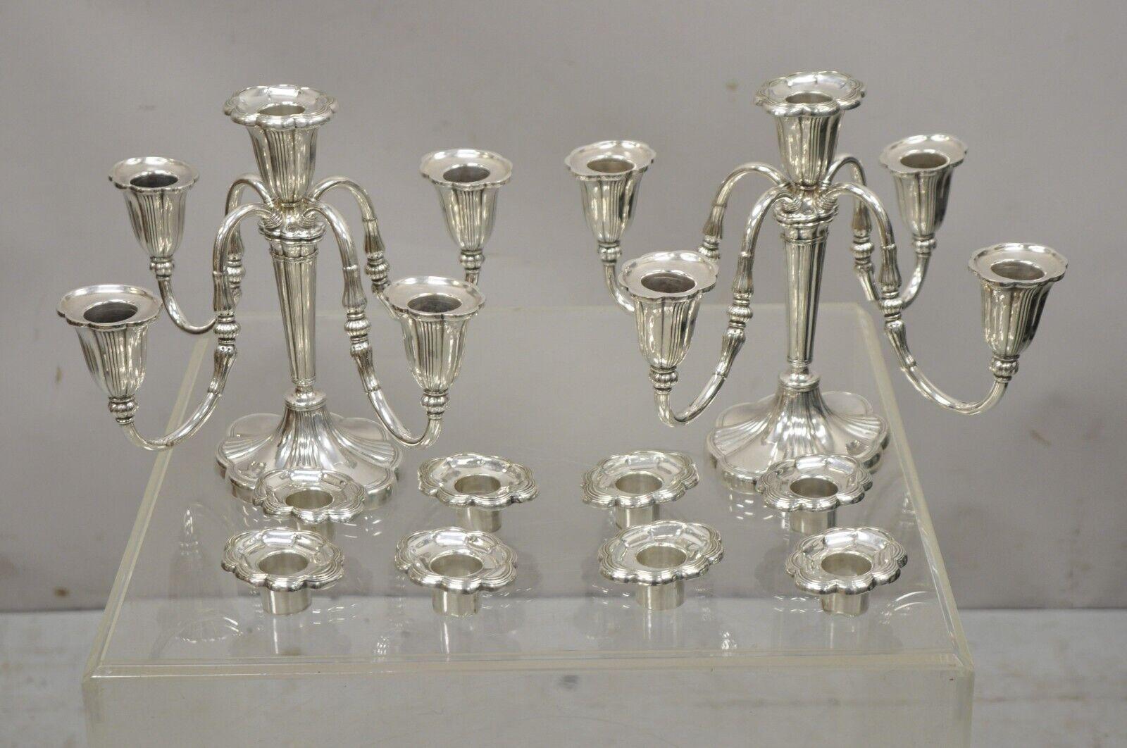 Antique GM Co. English Victorian silver plate 4 arm 5 candle candelabra - a pair. Item features 5 removable candle holder inserts, 4 scrolling arms, one central candle holder, 5 candle holders in total, original stamp, very nice antique pair,