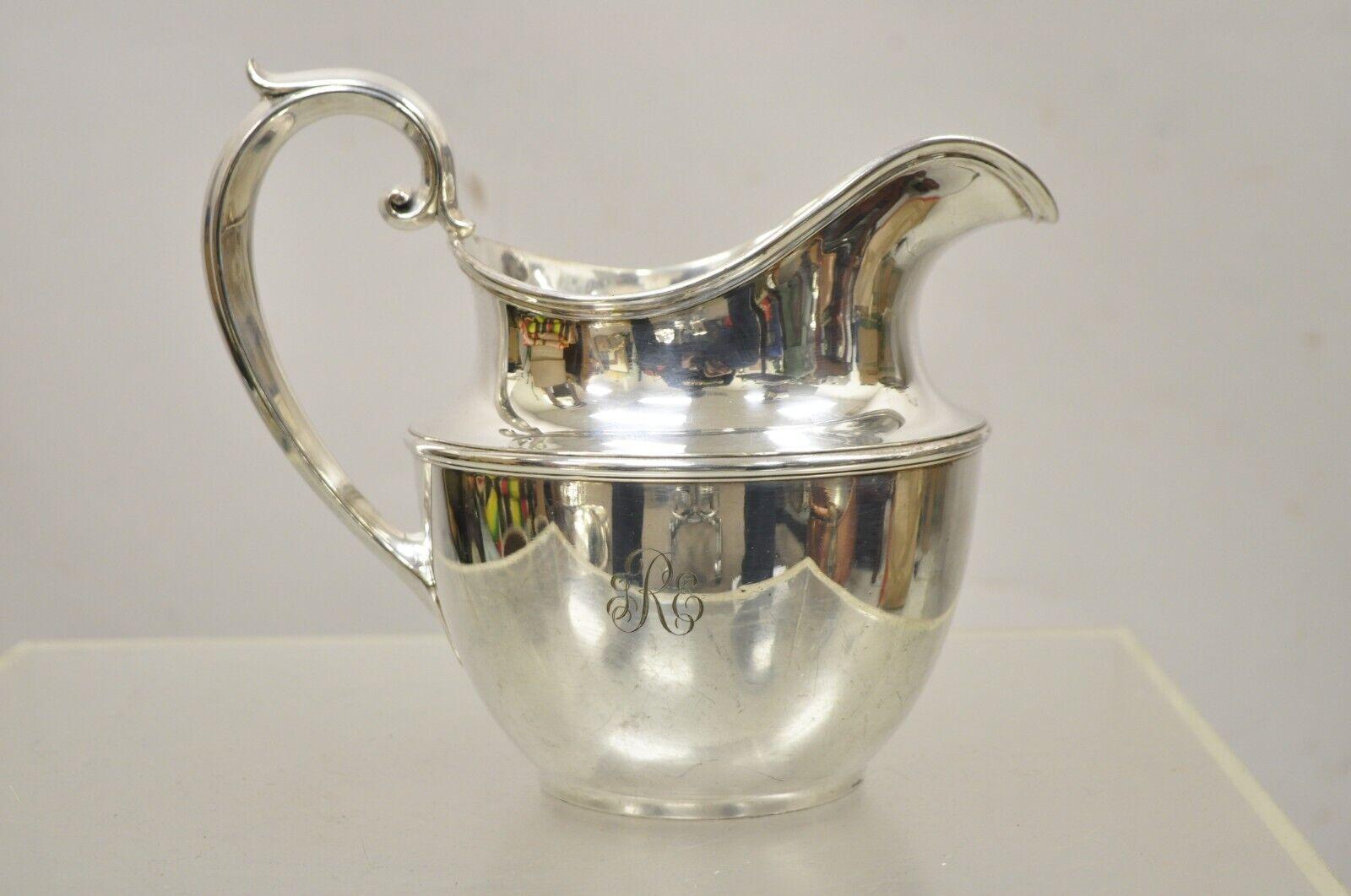 Antique GM Co. Silver Plated Victorian Water Pitcher with Monogram. Item features 