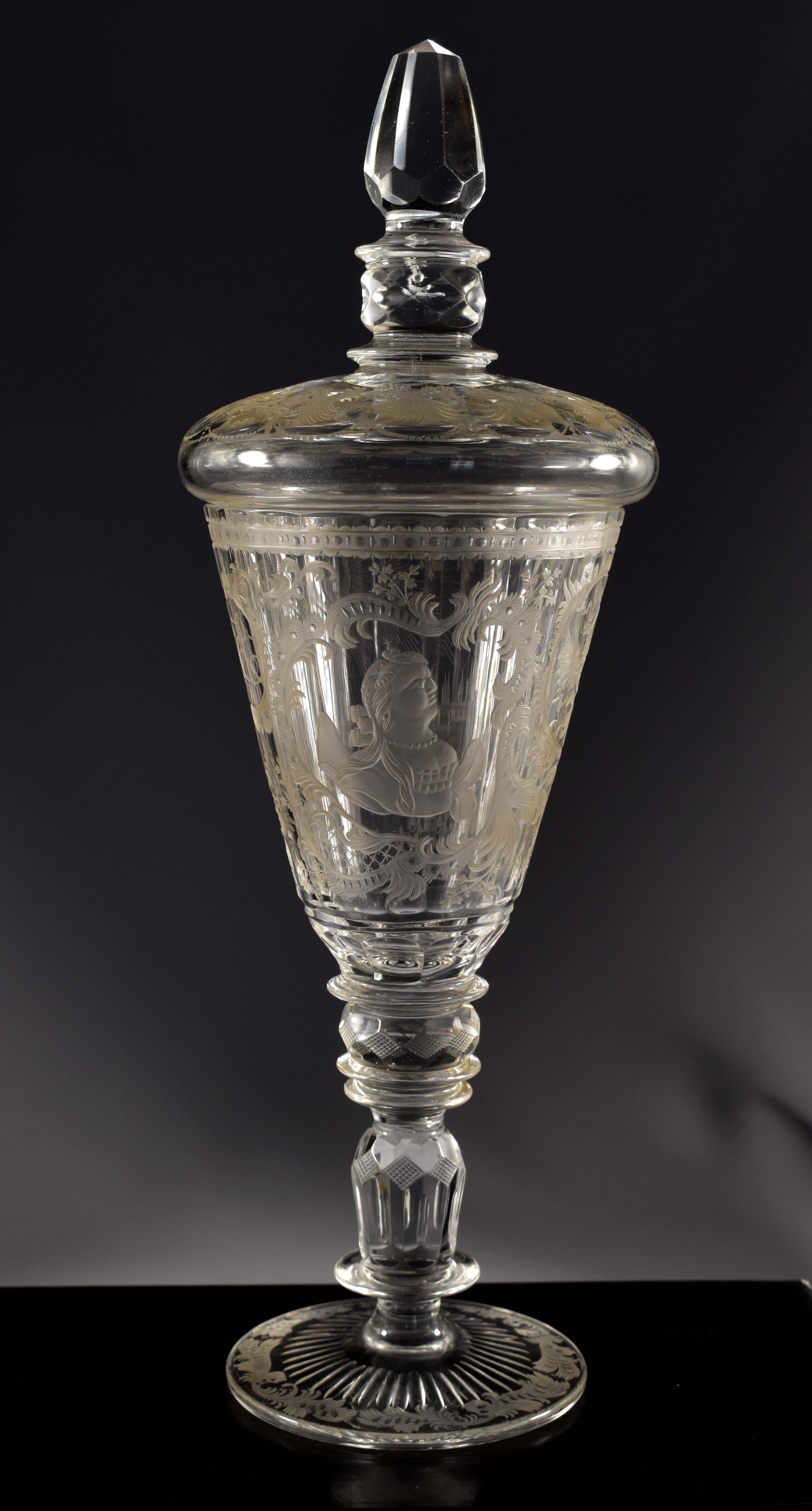 Beautiful cut goblet with engraving portrait of Catherine II the Great. There is also an engraved eagle, the city and the initials of the Russian Empress. Everything is complemented by beautiful engraved ornaments. We must not forget the amazing