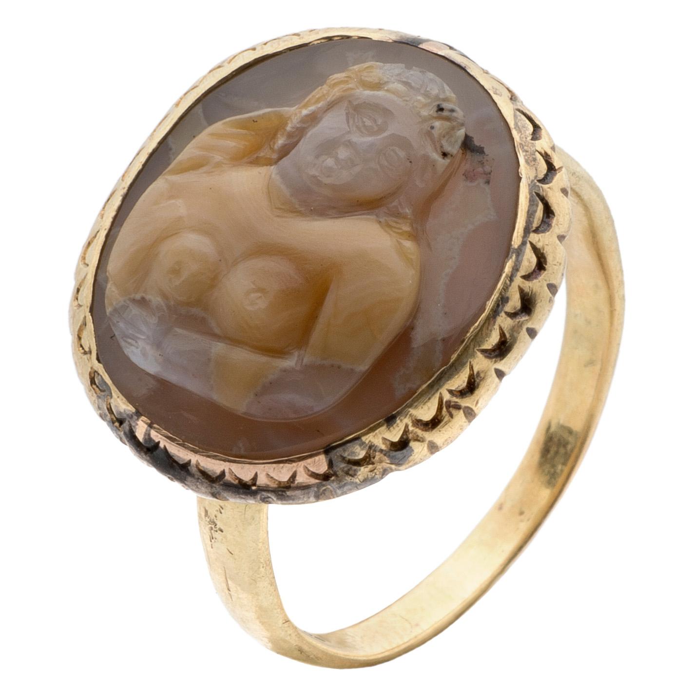 RENAISSANCE CAMEO RING 
Italy, cameo: second half of 16th century in a late 18th century ring 
Gold, agate , black enamel 
Weight 6.3 gr.; bezel 18.8 x 16.9 x 6.5 mm.; circumference 58.4 mm.; US size 8¾; UK size R 

Cameo of a nude female bust in