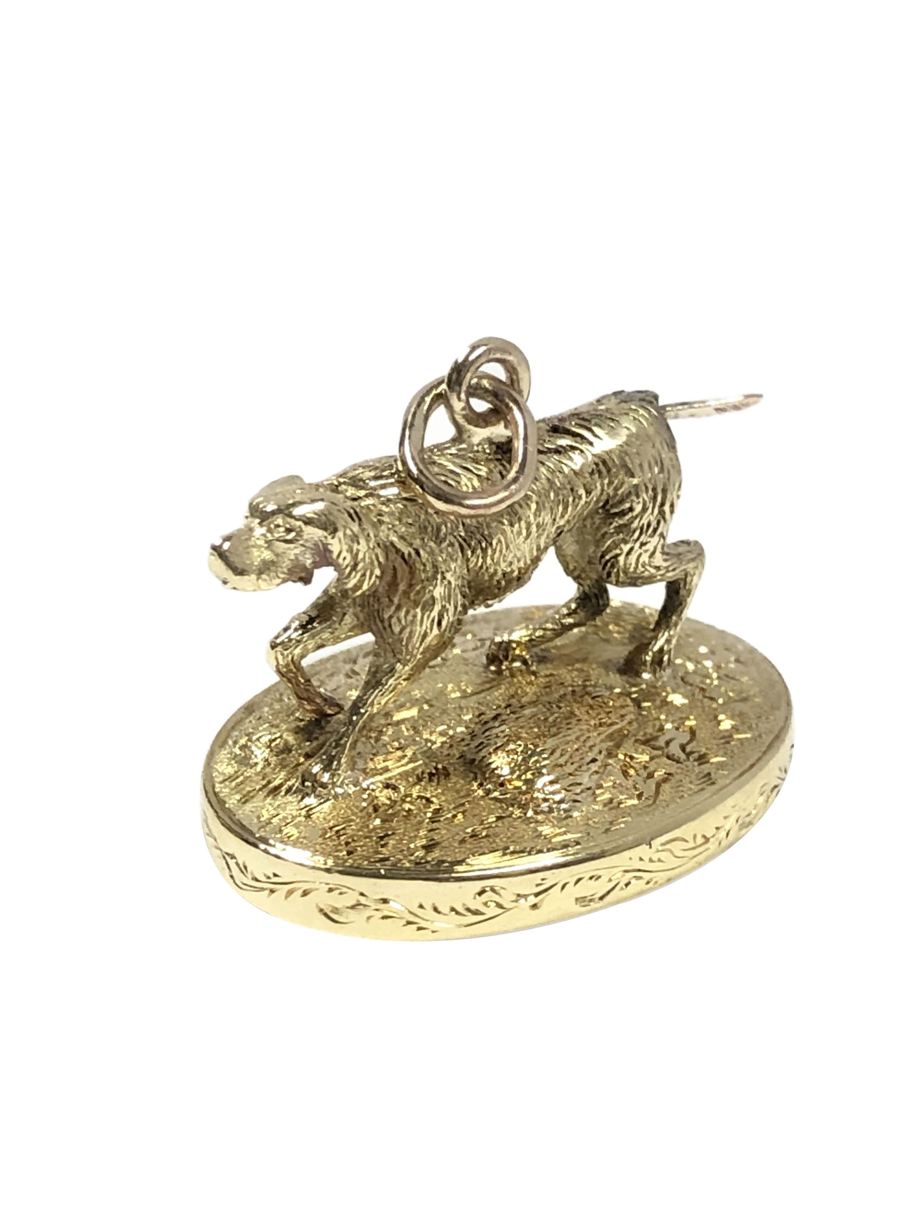 Circa 1890 Solid Gold Figural  Hunting theme Seal Fob, measuring 1 inch X 3/4 inch x 1 inch height. extremely well detailed hand chased Gold work, set with a Blood Stone having deep intaglio carving with a Hunting Dog, initials and the phrase 