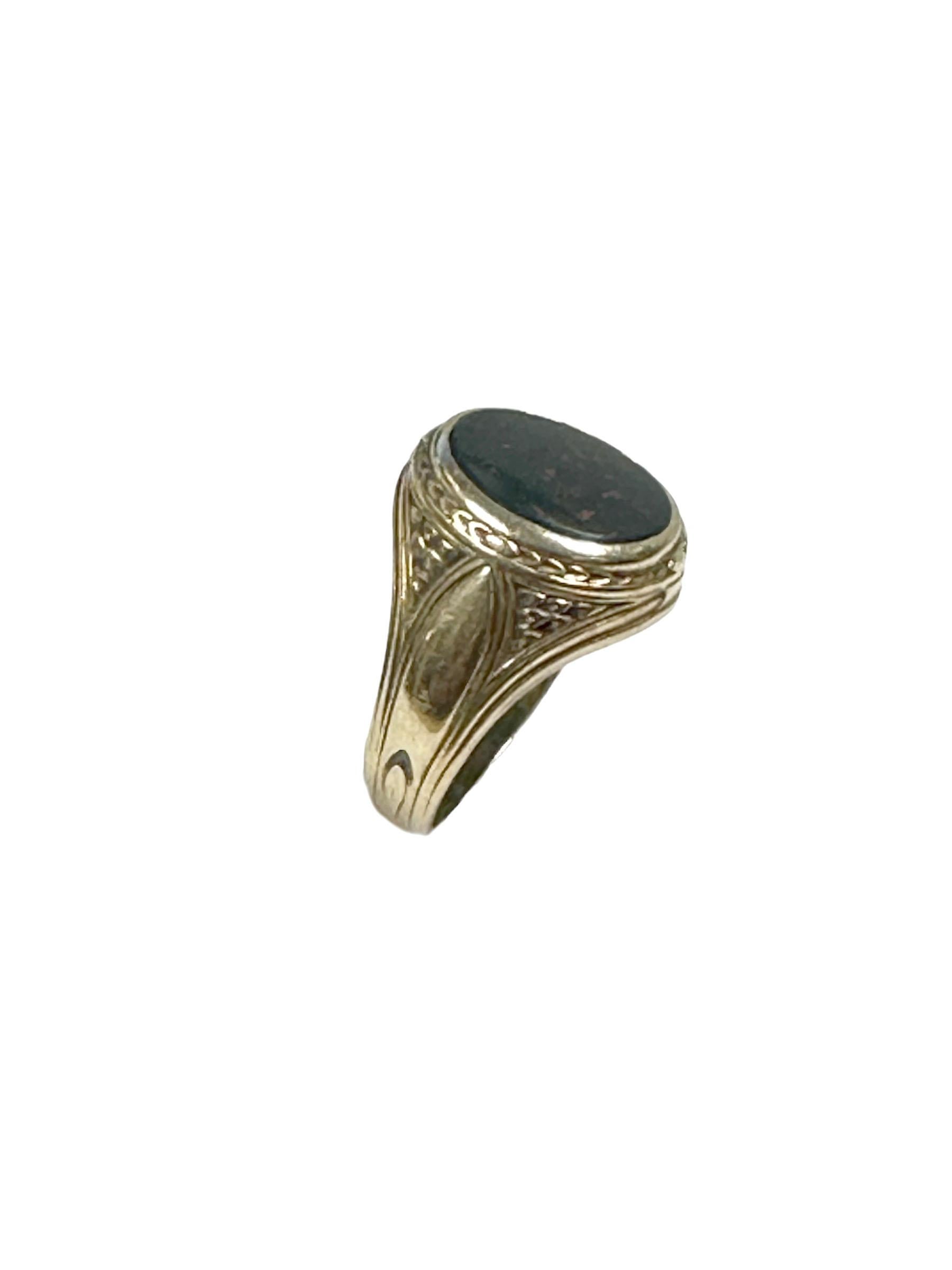 Circa 1910 10k yellow Gold Signet Ring, the top of the ring measures 5/8 x 1/2 inch and is set with a Blood Stone, nicely chased designed sides in an Edwardian style. Finger size 7.