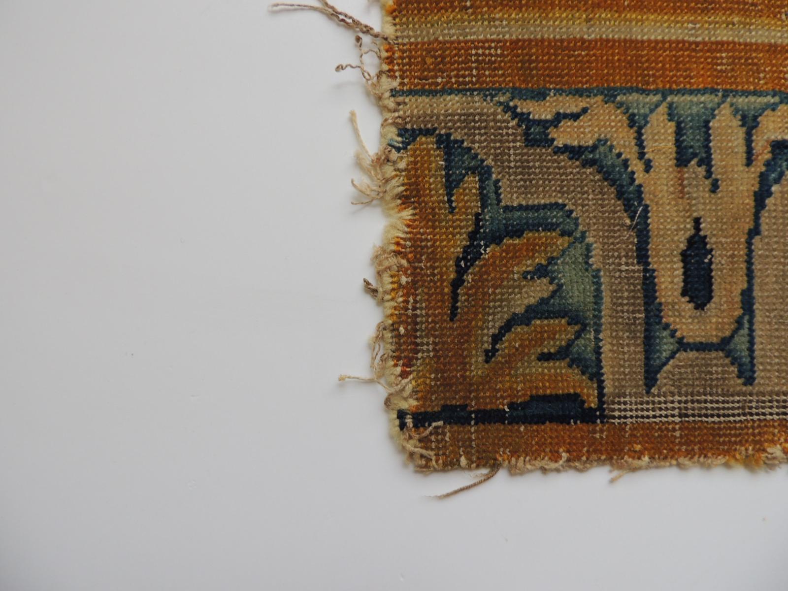 Antique gold and blue Savonnerie rug fragment.
Scrolling fragment with and urn and pastel blue coloration.
Small hole from aged.
Ideal to frame or to make a pillow.
Size: 7.5