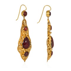 Antique Gold and Cabochon Garnet Pendant Earrings with Repoussé Decoration