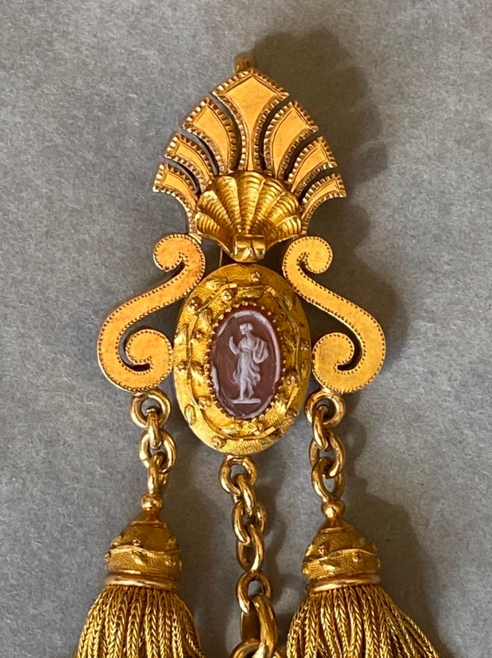 Very beautiful antique locket pendant, made in France circa 1870.

Made in multiple colors of 18k gold, mark for gold: the eagle head.
Dimensions: 7.5 cm height (3 inches), 2.5 cm width (1 inche).
The cameo are in agate stone.
The locket opens and