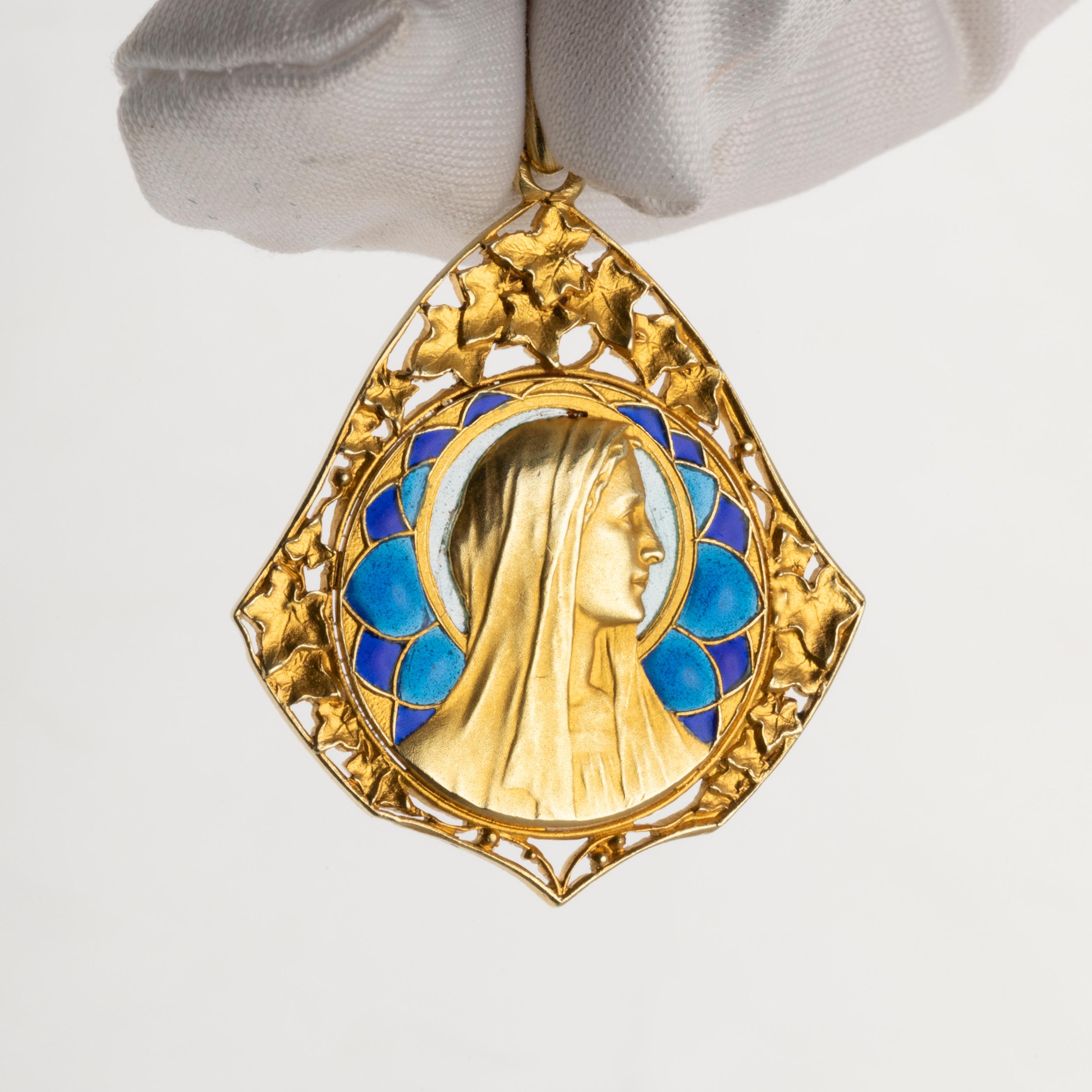 Antique Gold and Enamel French Medal

Very beautiful medal, french made circa 1900.
Big size: 33 * 28 mm 
Gold 18k and email plique à jour.
Signed by PL DASSET.
Total weight 6.20 grams