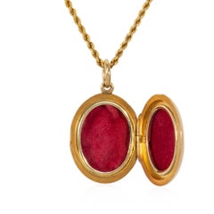 Antique gold and garnet locket and chain