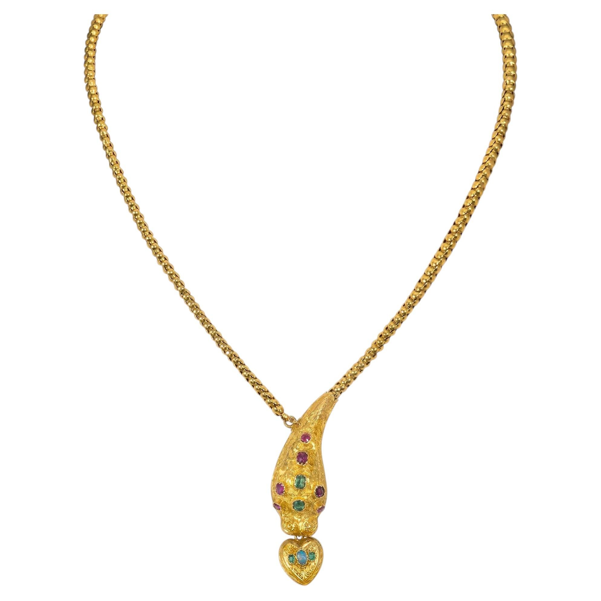 Collar antiguo con forma de serpiente, de oro y con piedras preciosas engastadas en venta