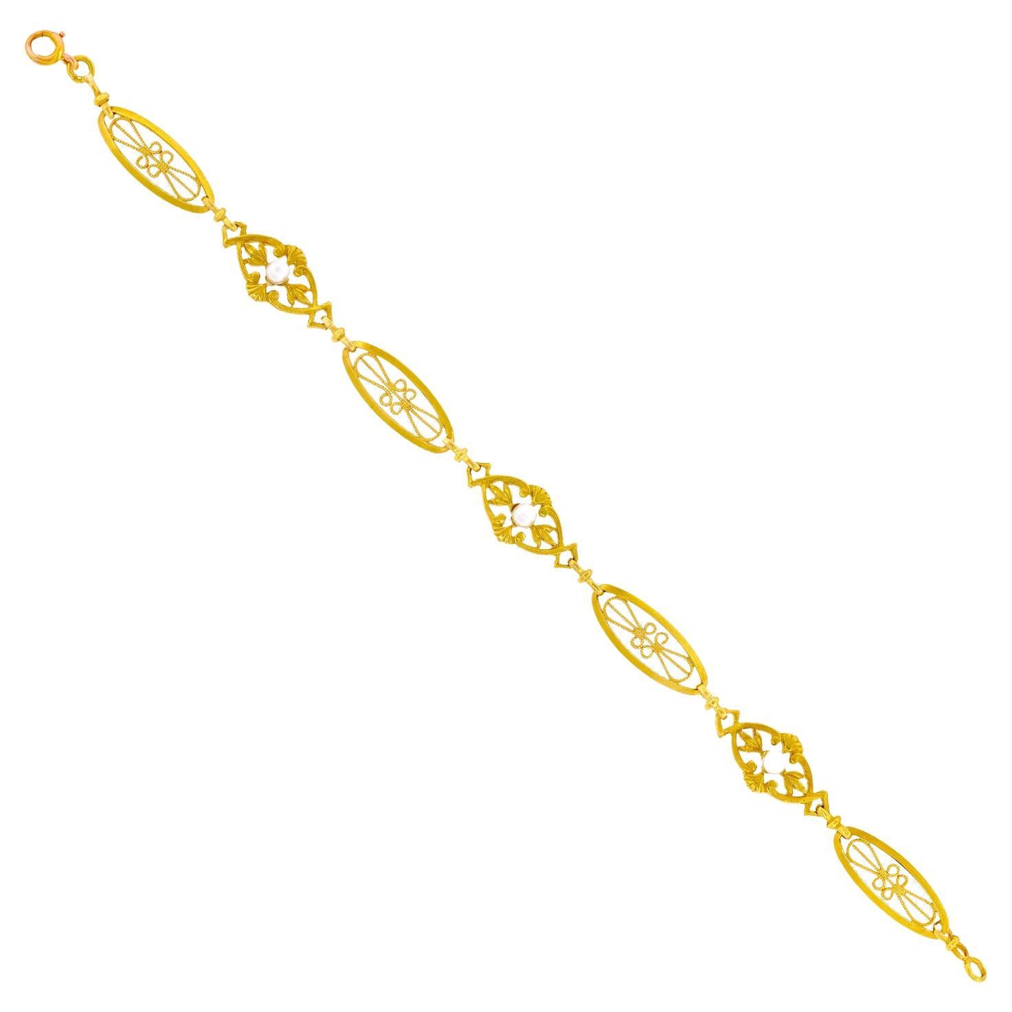 Bracelet français ancien en or et perles