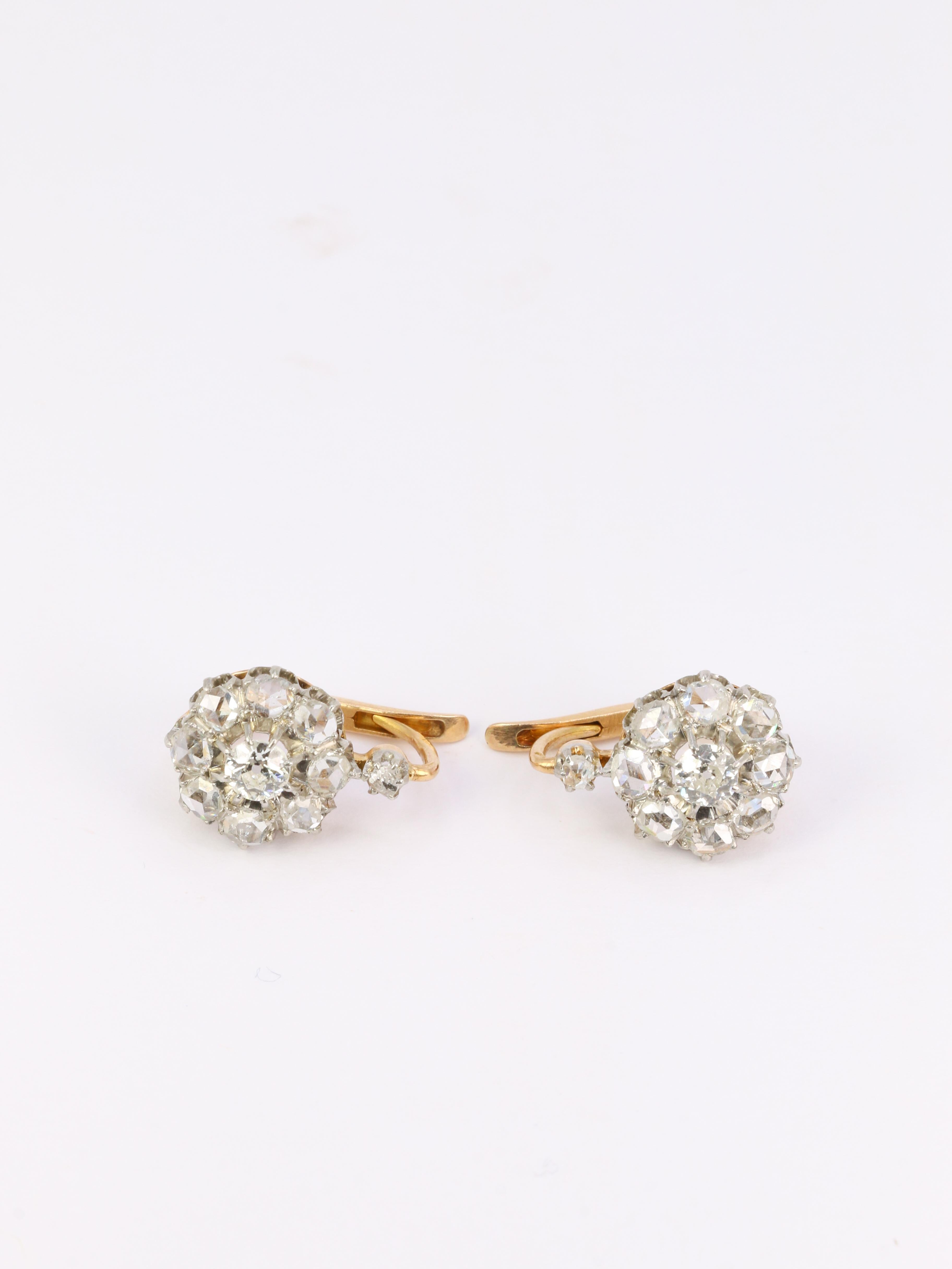 Women's Antique gold and silver earrings set with old mine cut diamonds