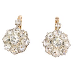 Antique gold and silver earrings set with old mine cut diamonds
