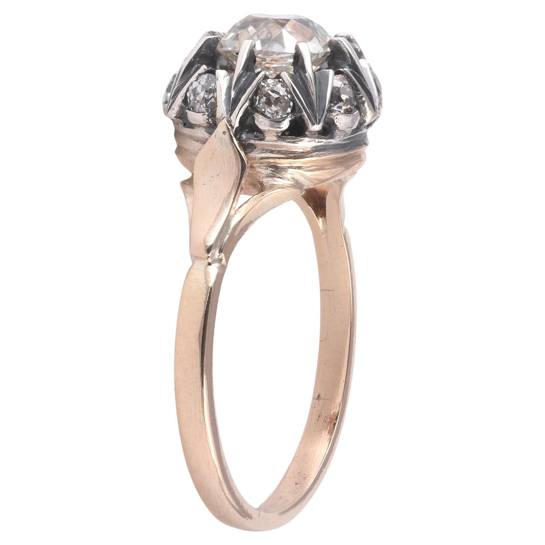 Ring adorned with an old cut diamond of approximately 1.5carat. Frame in yellow gold and silver. 
Size 8. 
Weight: 3.7 gr. 